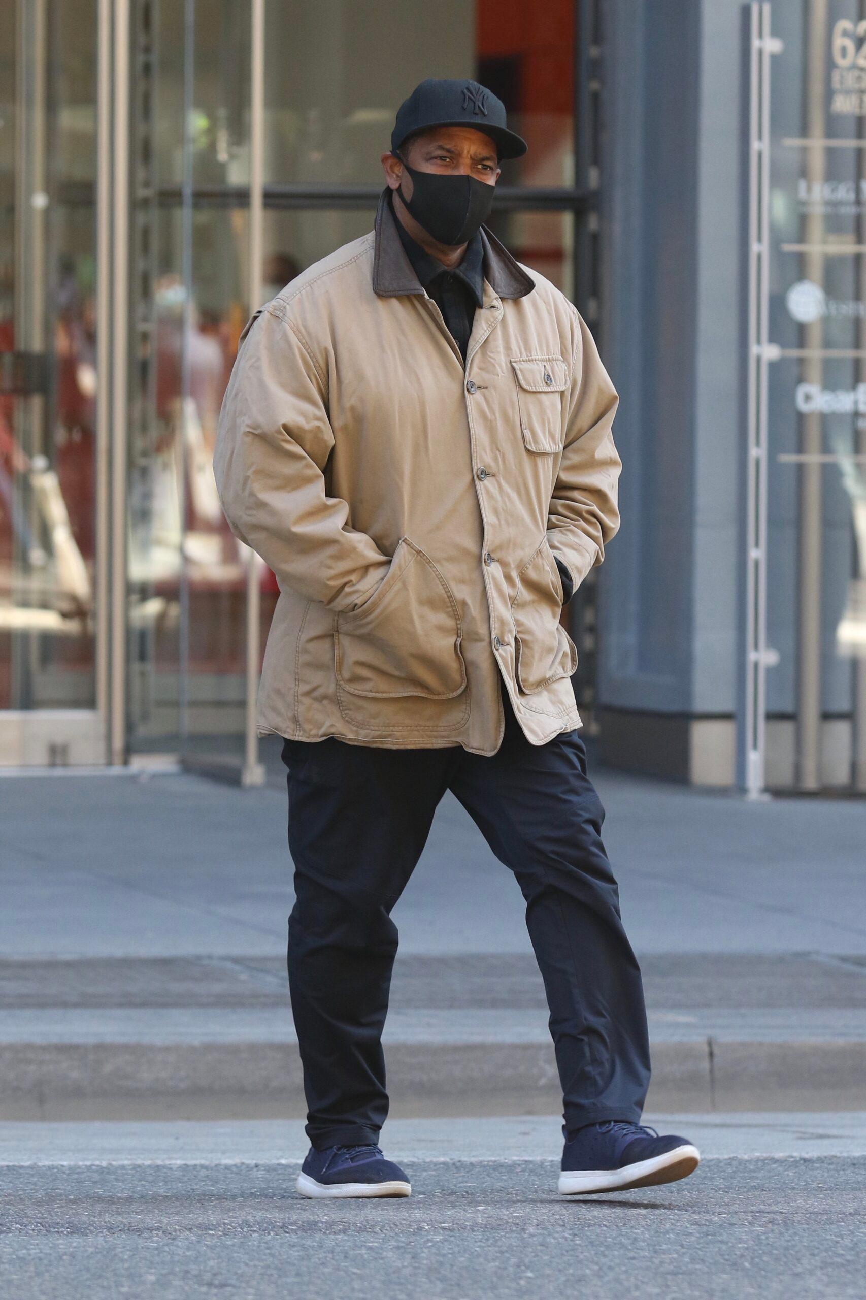 Denzel Washington all bundled up while on the set of his upcoming directed movie Journal for Jordan in NYC