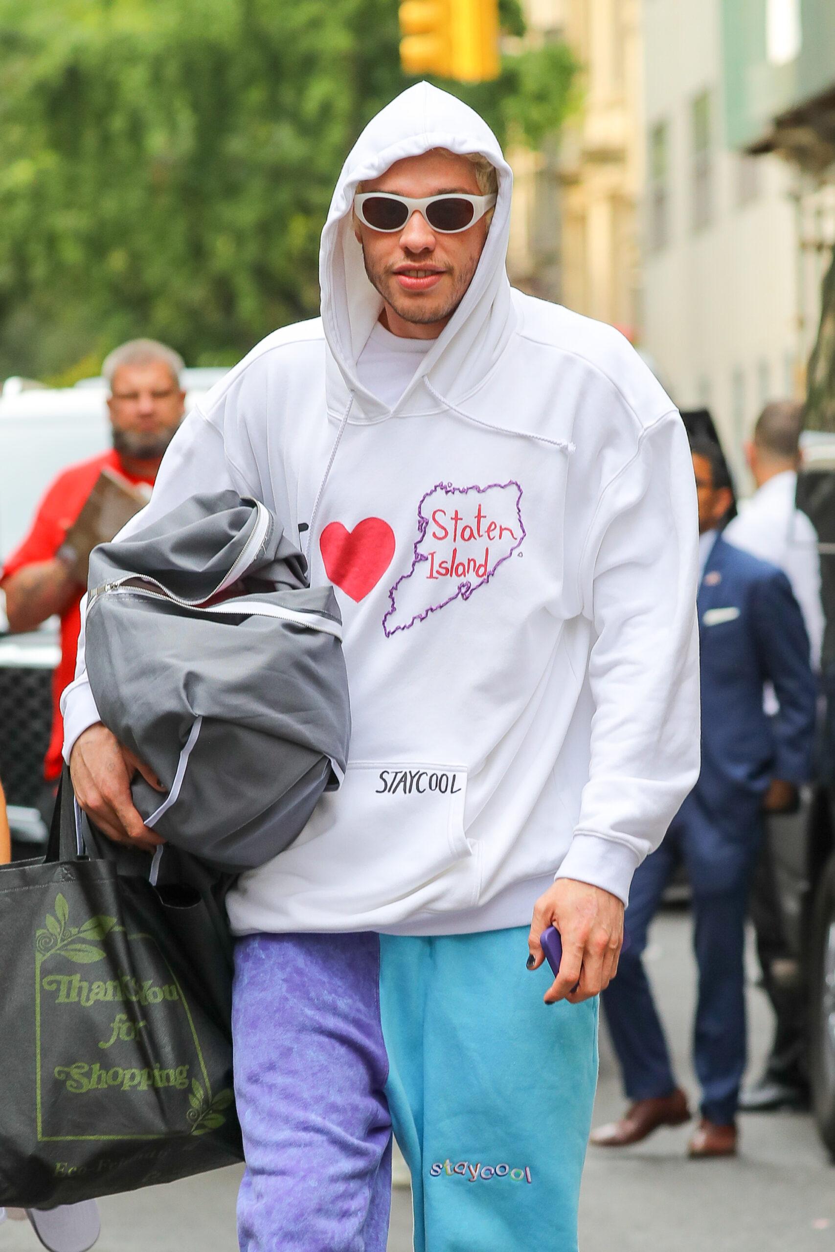 Pete Davidson spotted taking a picture with a fan as he leaves The Carlyle Hotel in NYC
