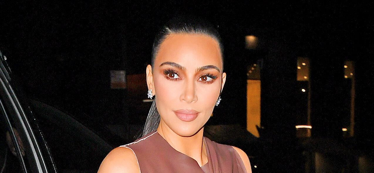 Kim Kardashian wears a leather dress from her upcoming Fendi x Skims release