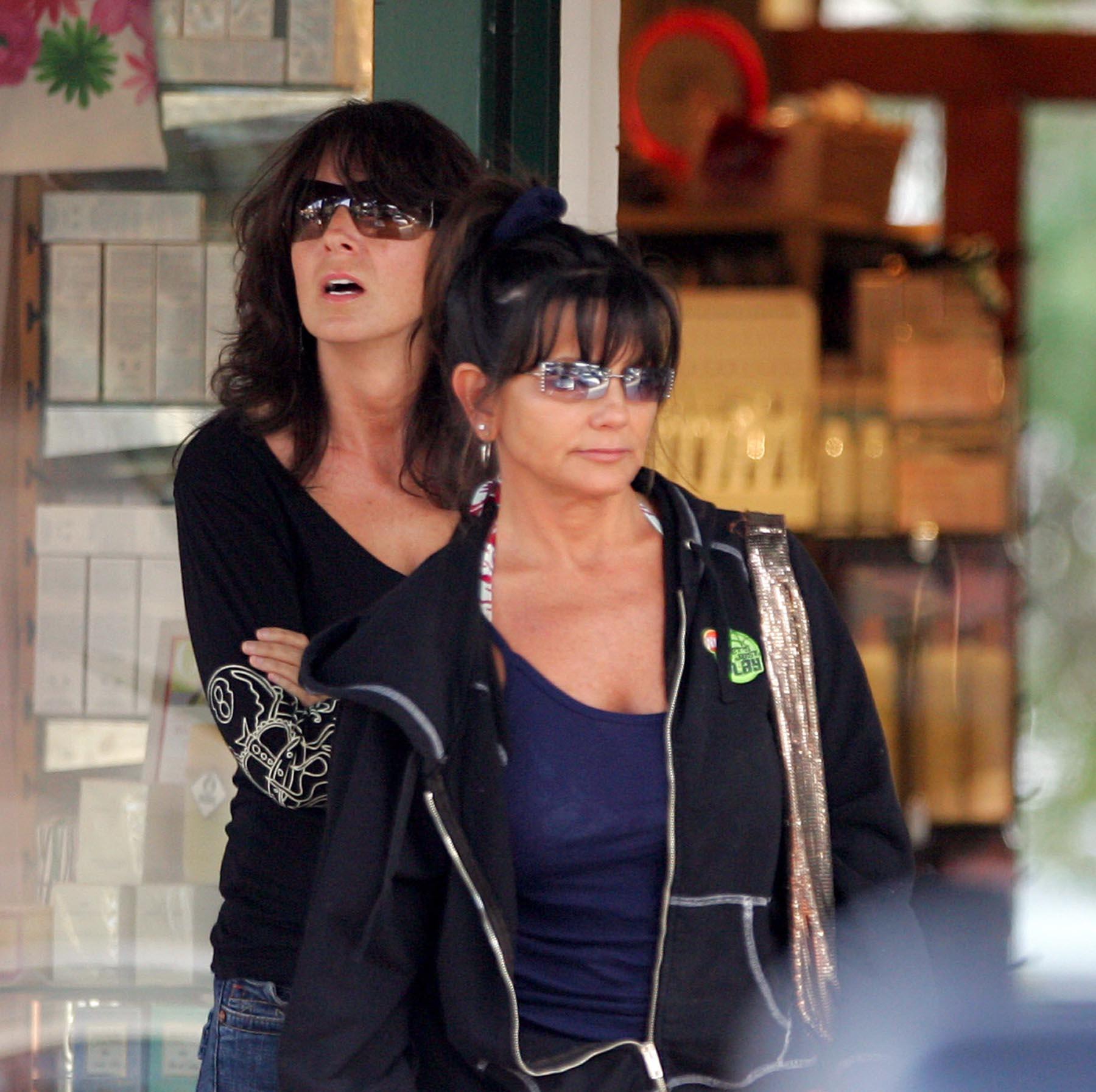 Lynne Spears standing with a friend.