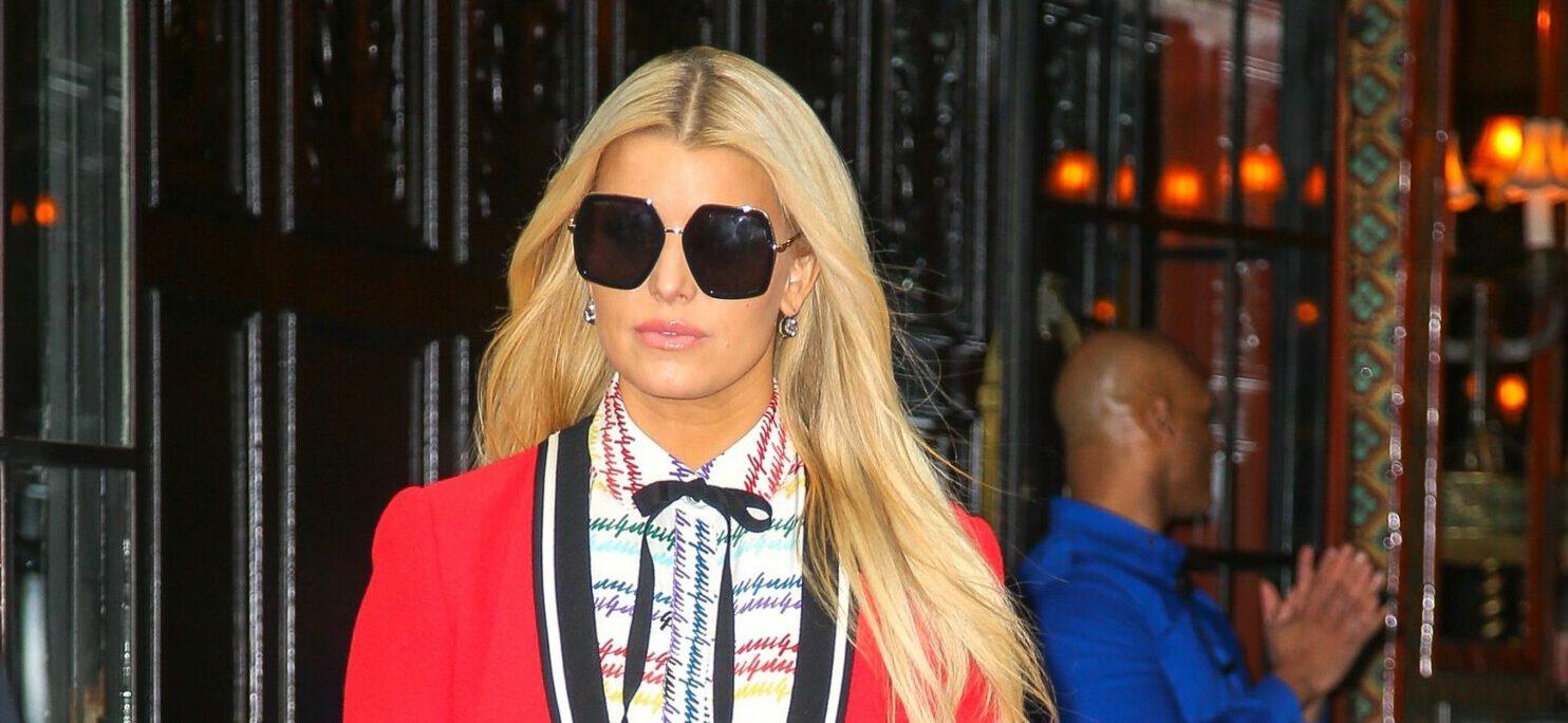 Jessica Simpson seen wearing a red blazer as leaving her hotel in NYC on Feb 06 2020