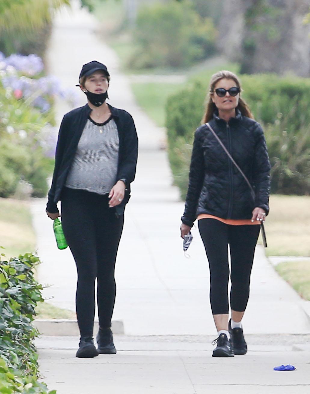 Katherine Schwarzenegger enjoys a walk with her mother Maria Shriver
