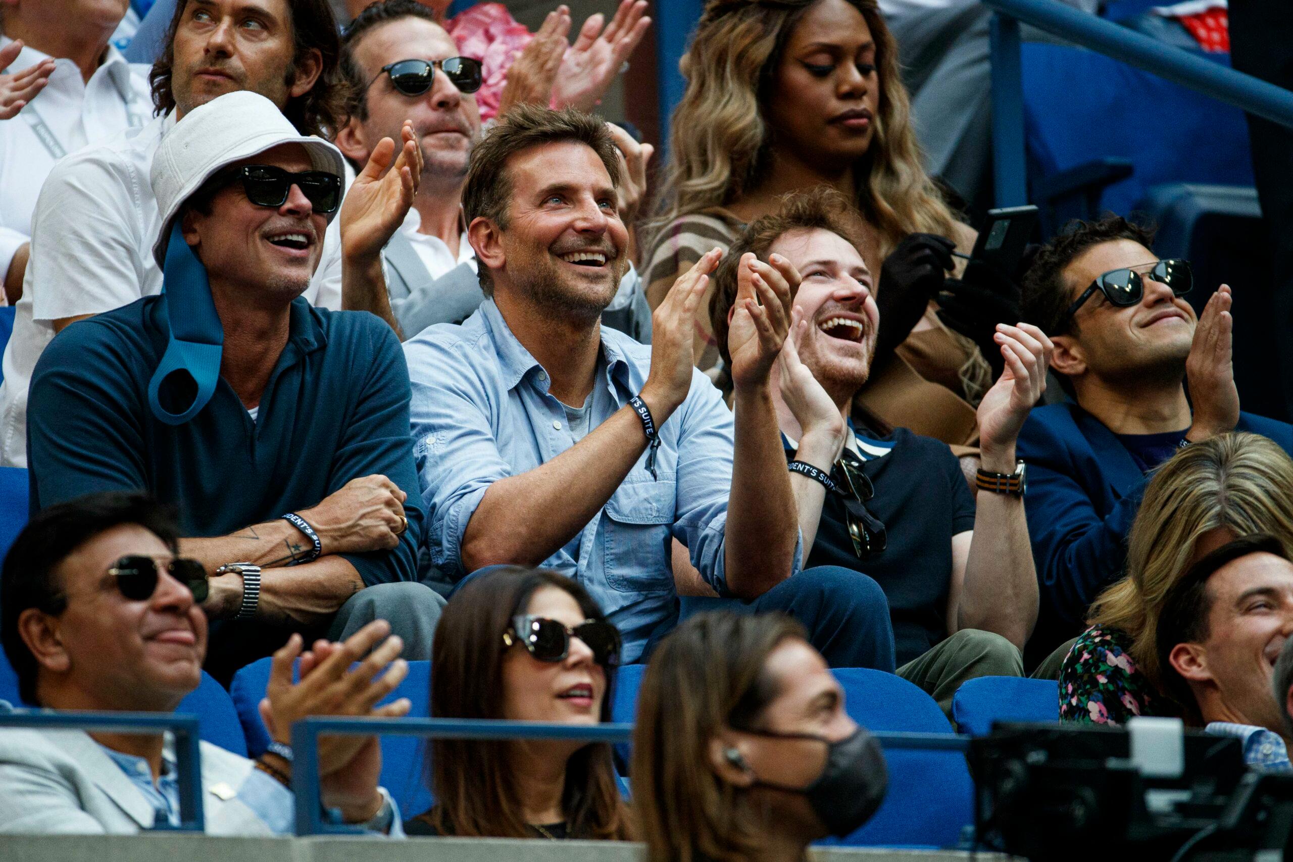 Brad Pitt and Bradley Cooper are pictured during the men apos s finals match of the US Open at the Arthur Ashe Stadium