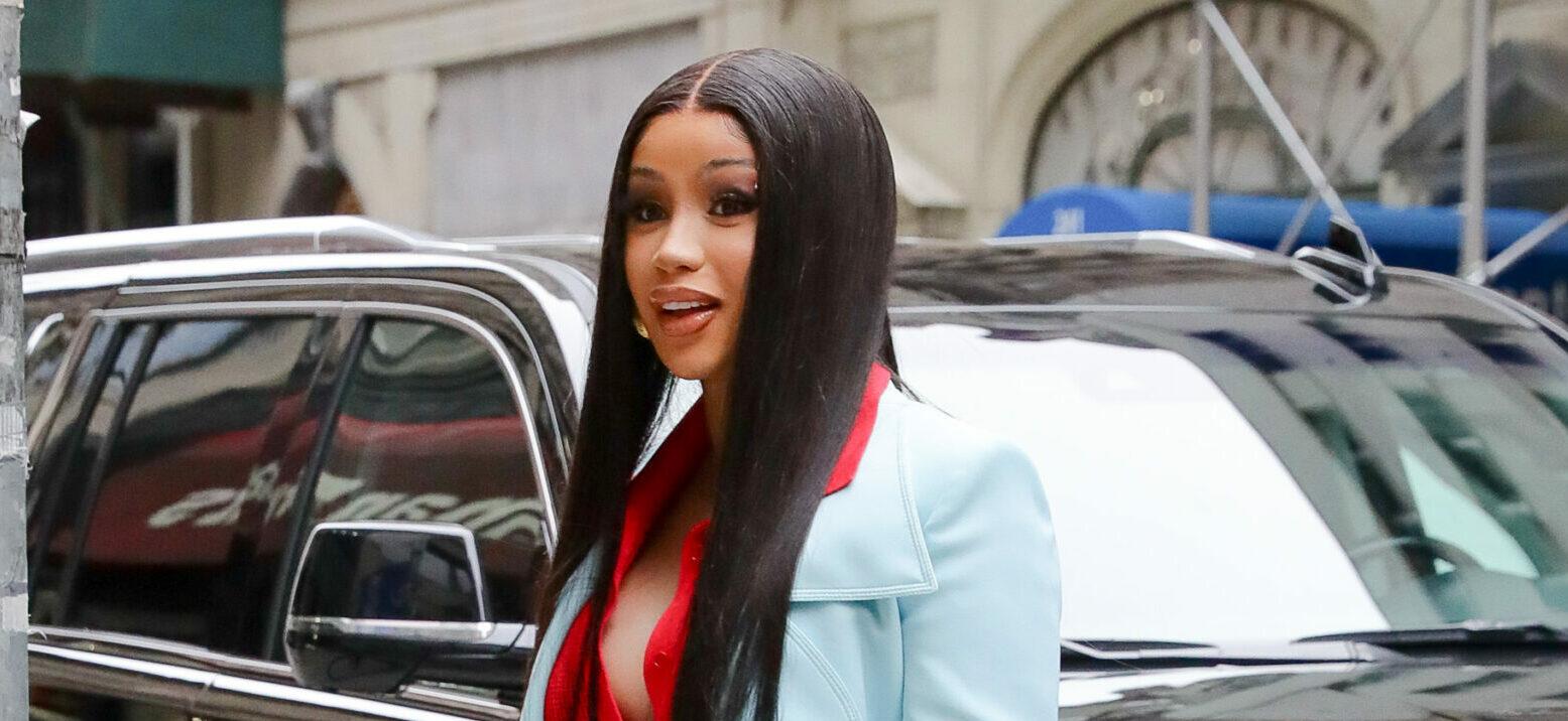 Cardi B looks looks radiant in a light blue suit as arriving at an office building in NYC