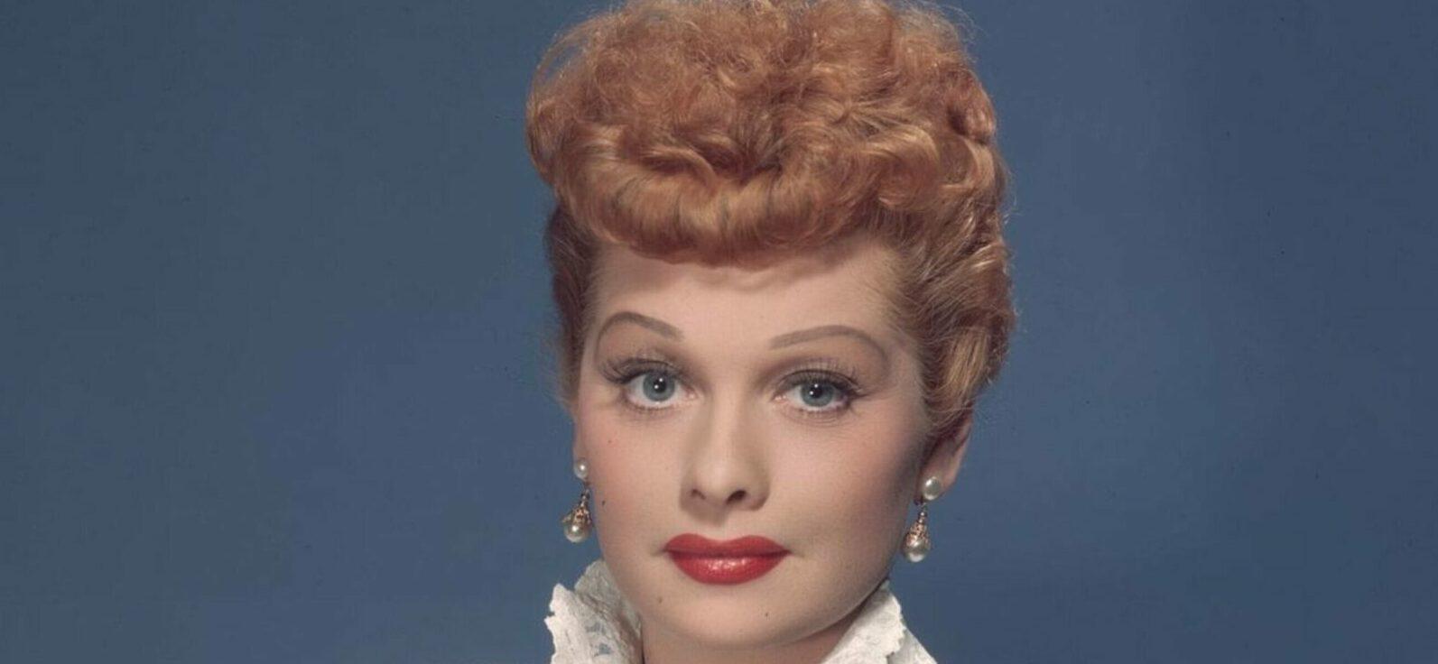 A photo showing Lucille Ball in a white net jacket and black dress.