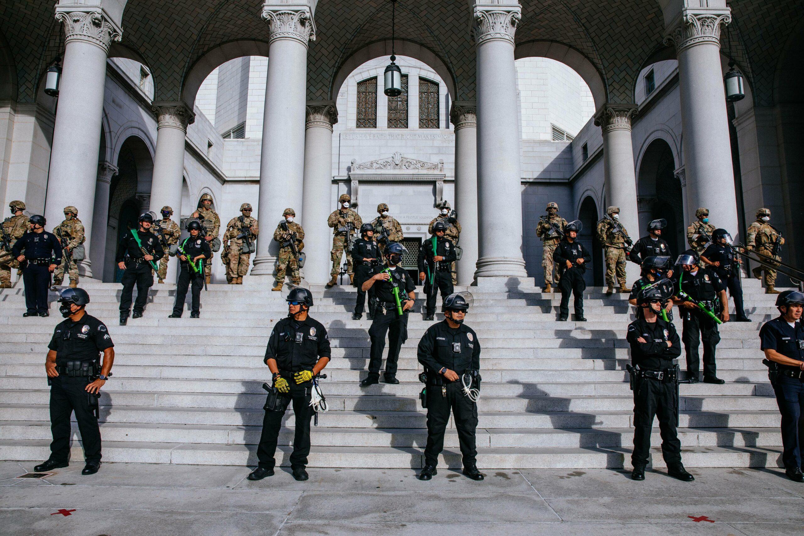 Los Angeles police standing on stairs