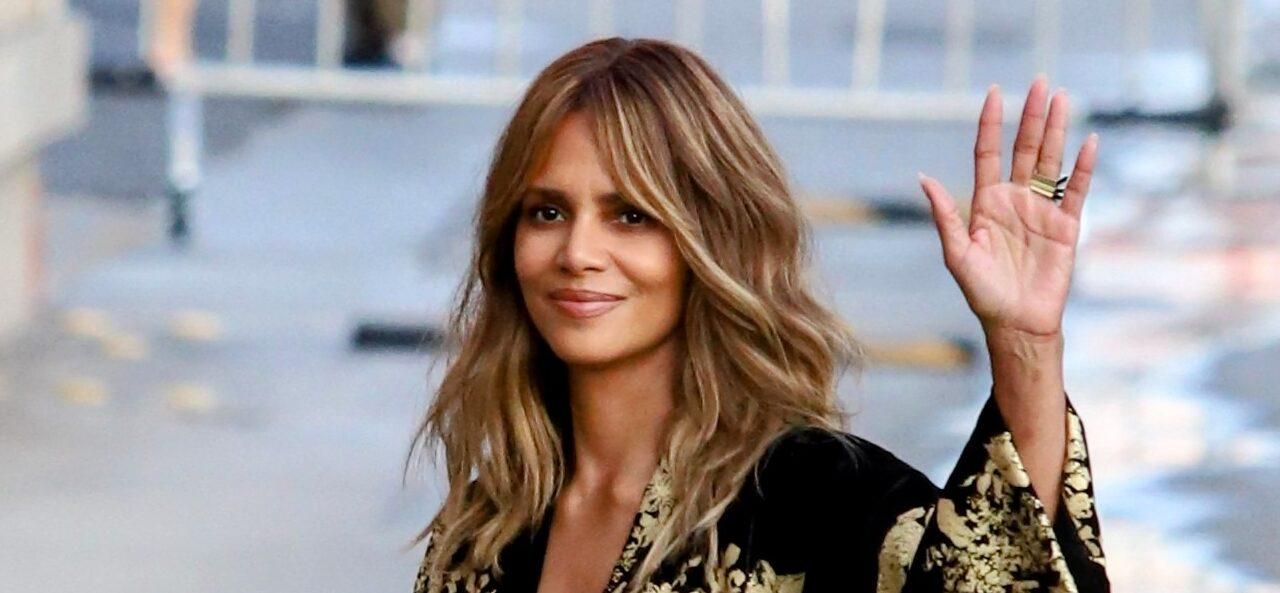 Halle Berry smiling and waving