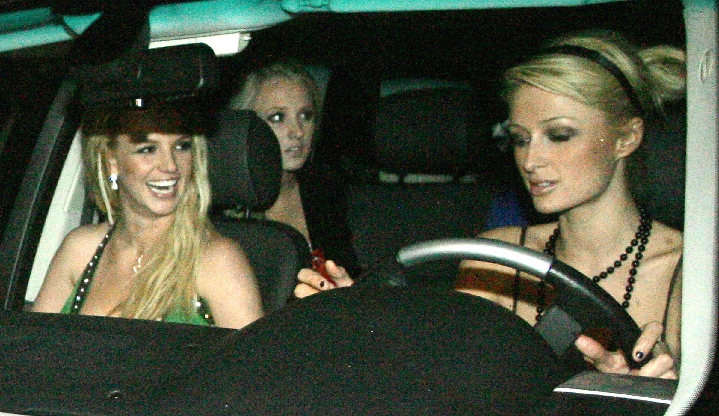 Paris Hilton and Britney Spears photographed inside the car.