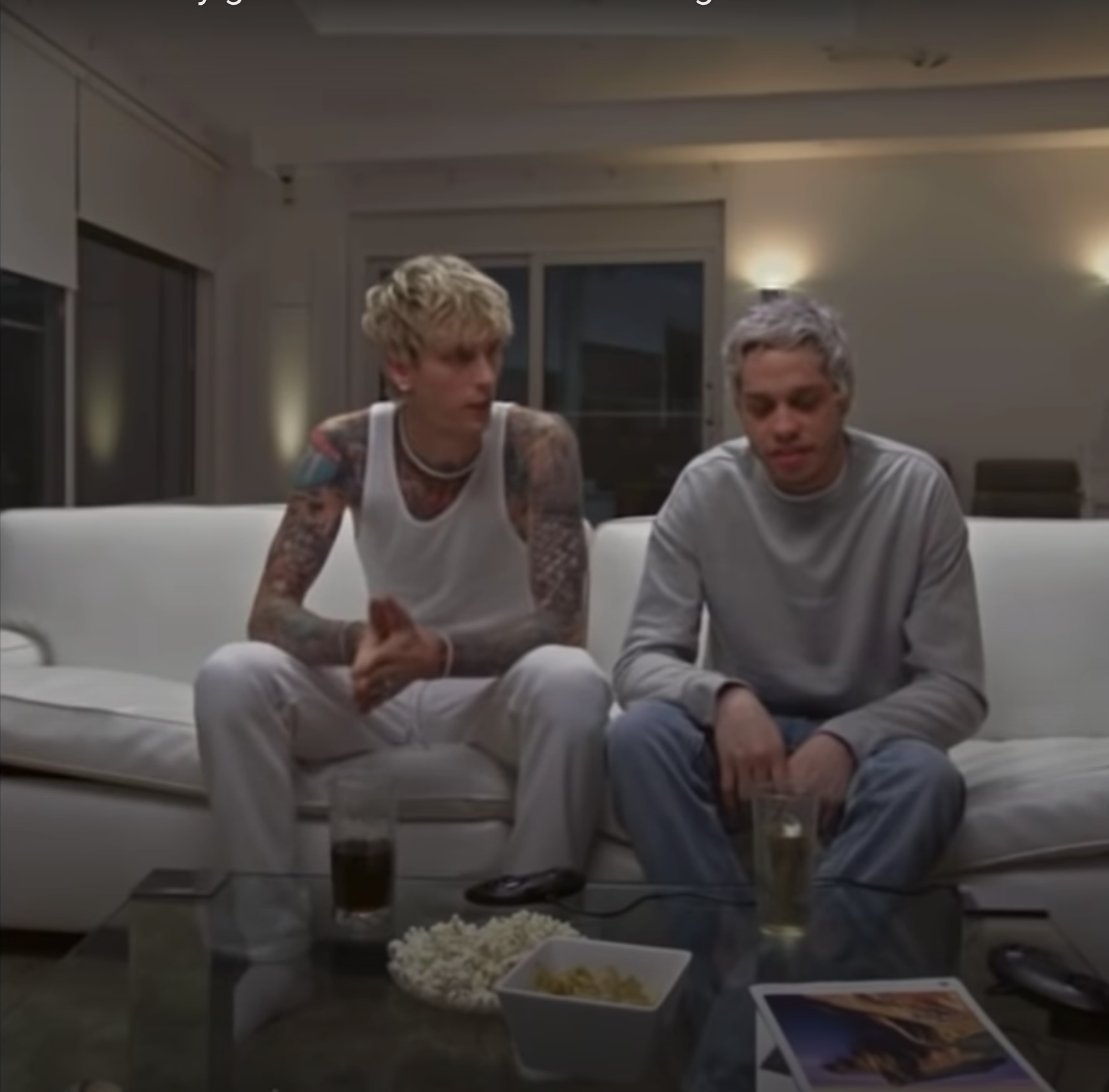 Pete Davidson & MGK on a couch