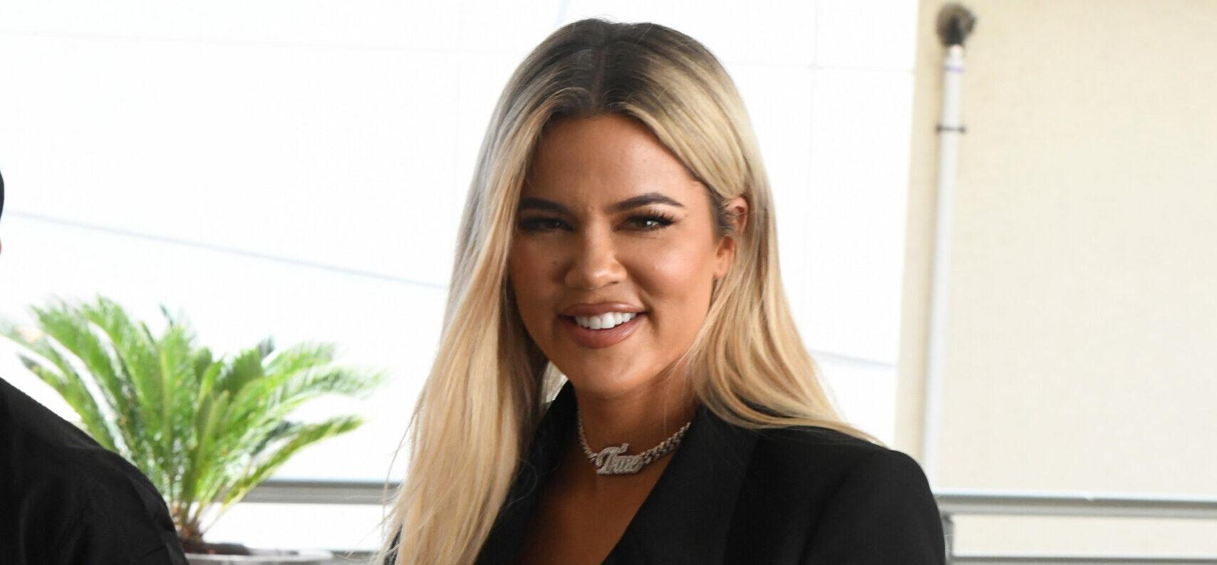 Khloe Kardashian shows off her legs in a tiny minidress while rocking a pink diamond ring from ex-boyfriend Tristan Thompson at a mall in Miami