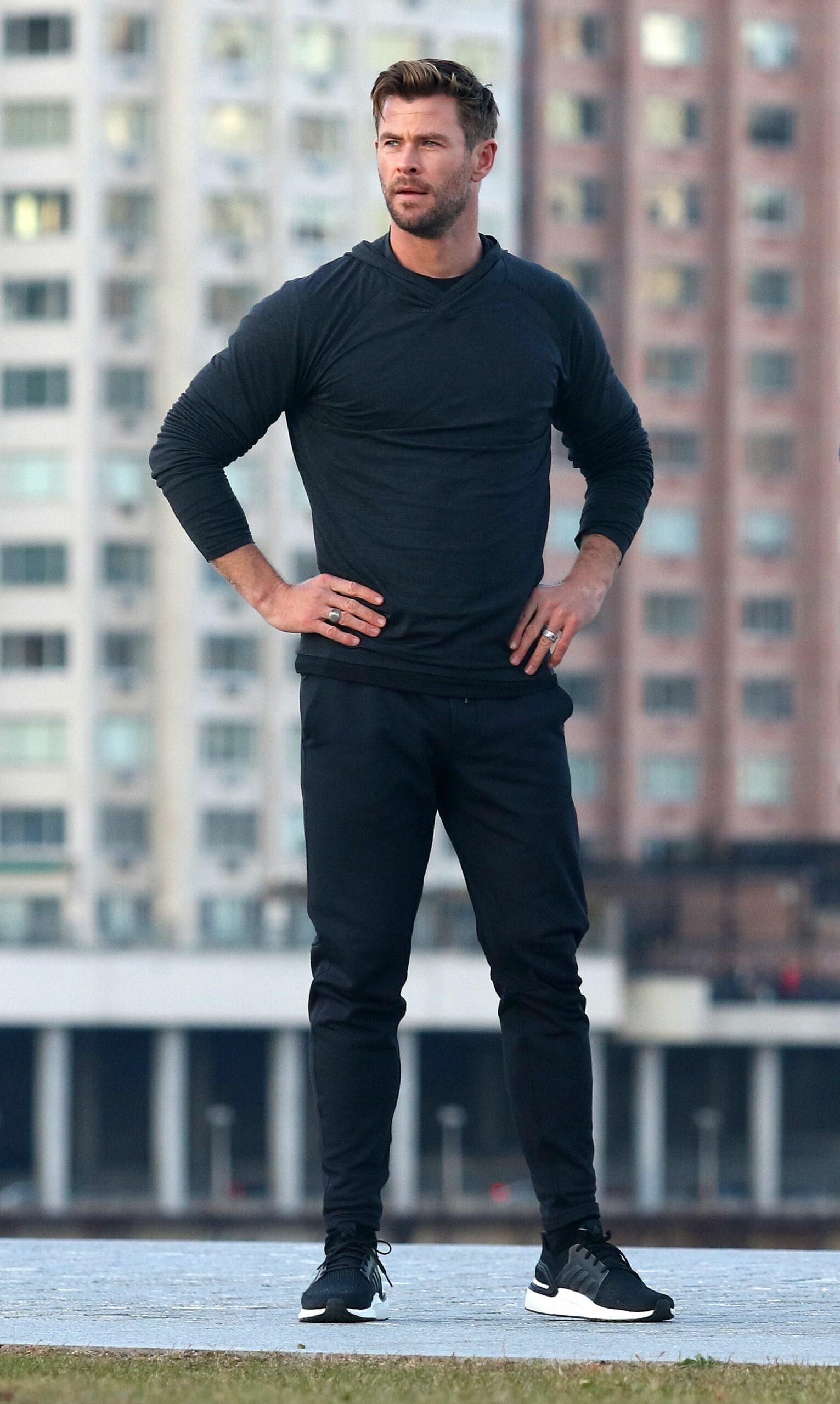 Chris Hemsworth jogs all over the city of Manhattan as filming wraps on Roosevelt Island for his HUGO BOSS commercial in NYC