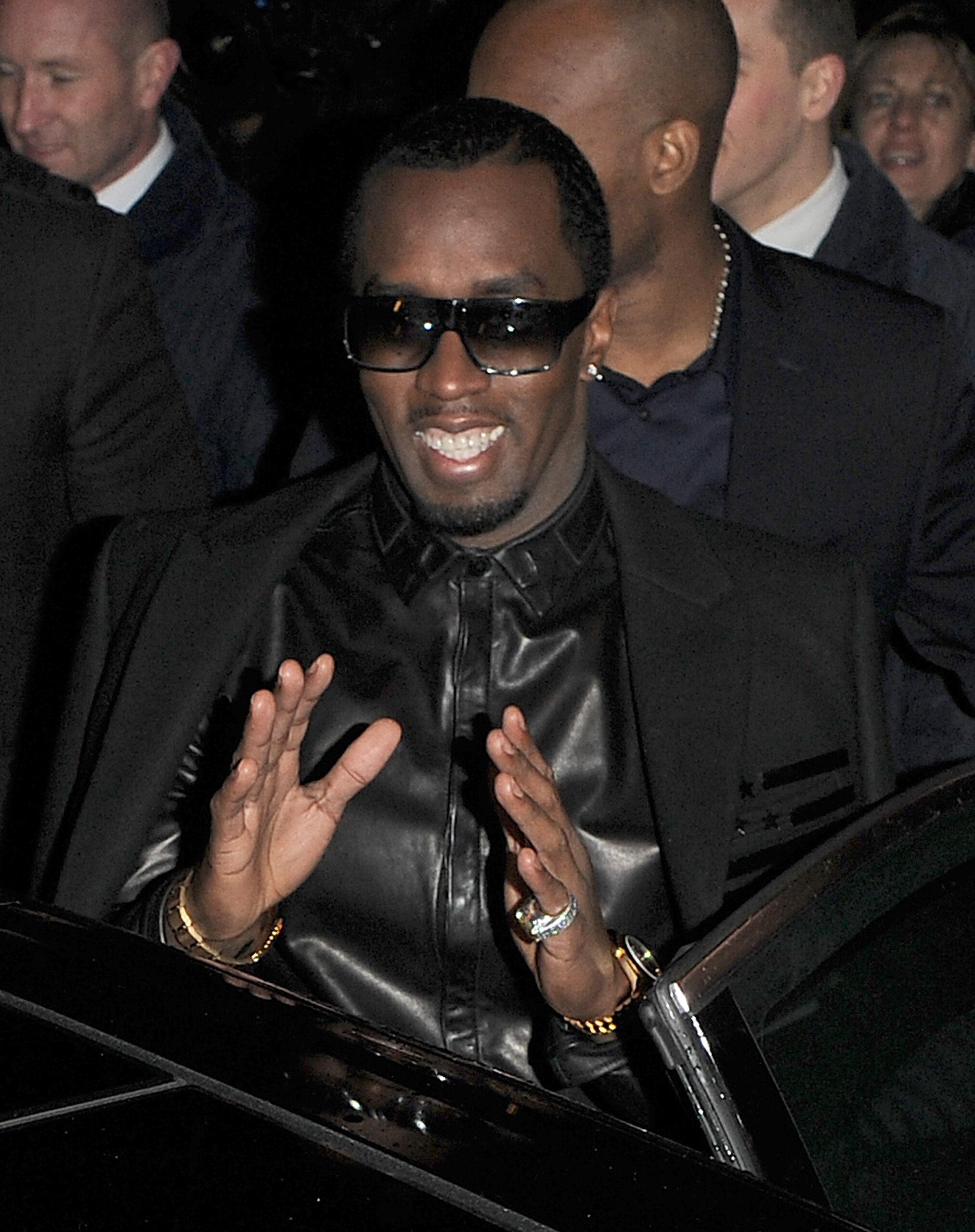 Diddy and other celebrities at the Paris Fashion Week a w 2012 Givenchy catwalk show