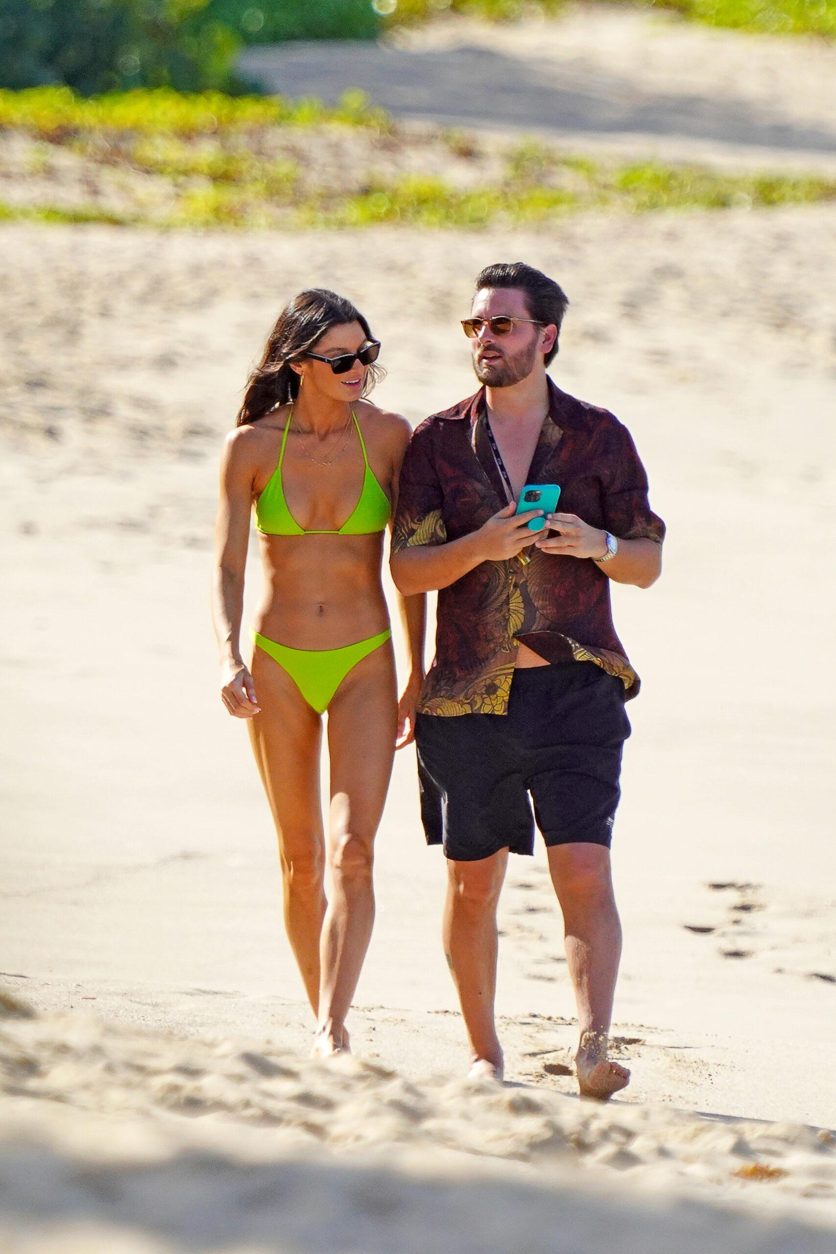 Scott Disick and model Bella Banos is seen strolling one of the beaches during holidays season in St-Barts