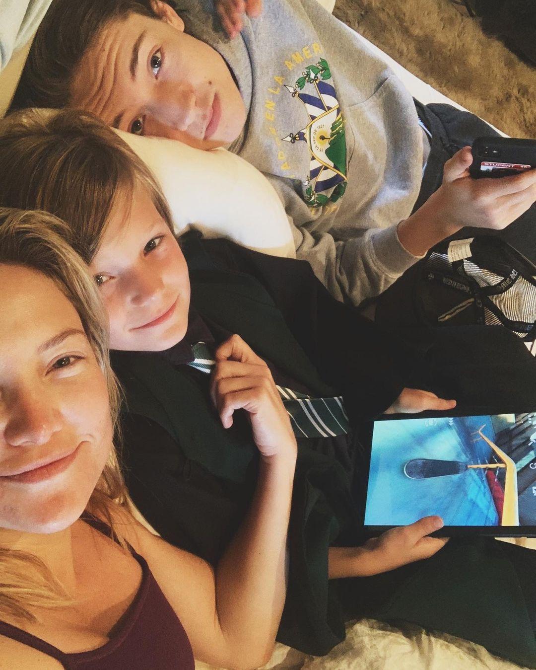 Kate Hudson cuddles with her sons