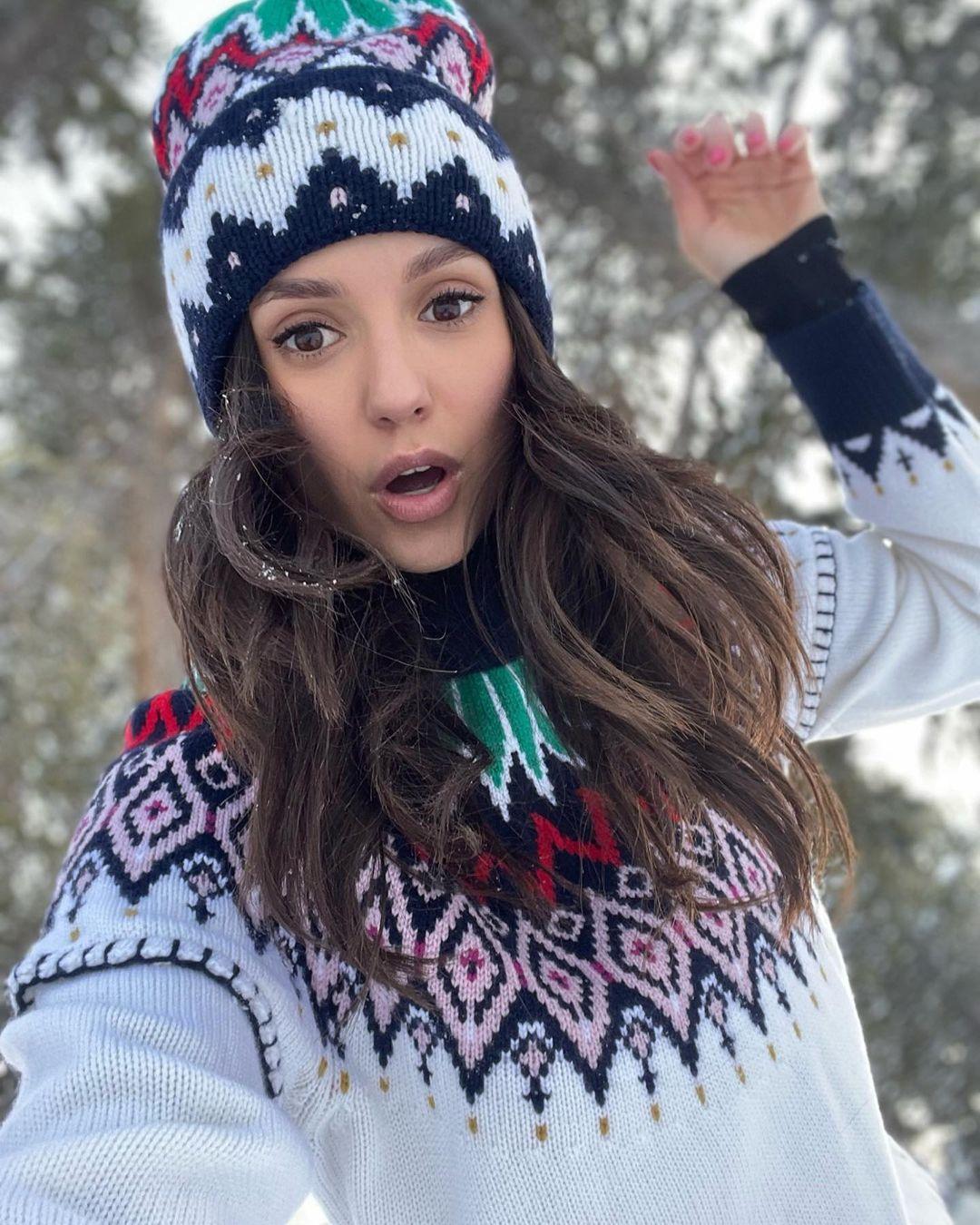 Nina Dobrev enjoys a snow day