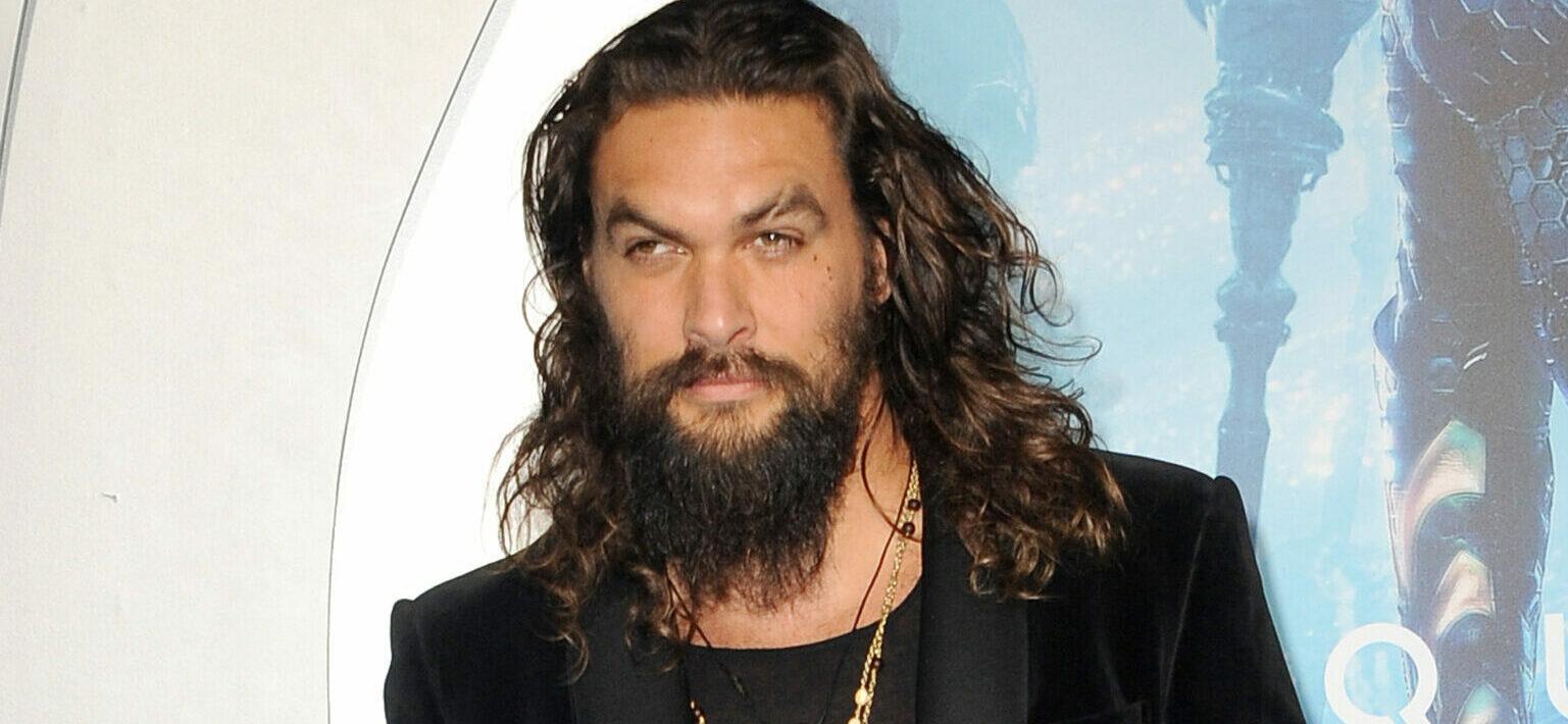 Jason Momoa posing for the camera.