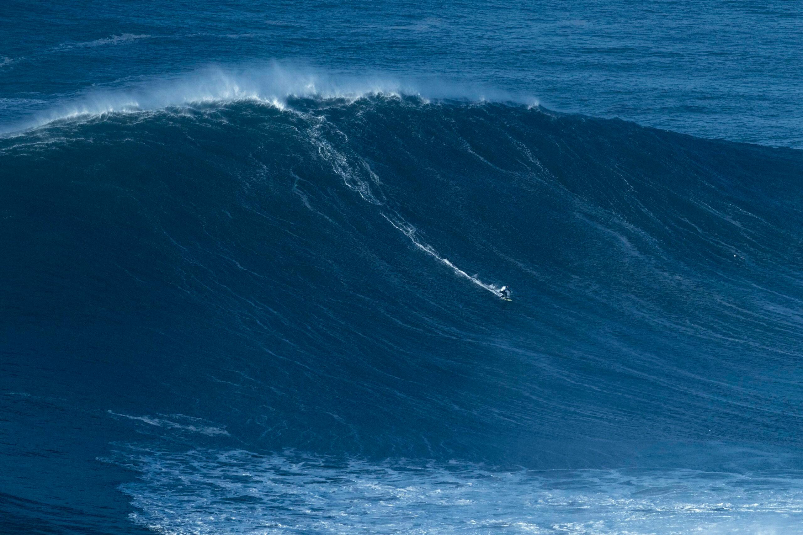 Big wave surfing in Nazare, Portugal - 08 Jan 2022
