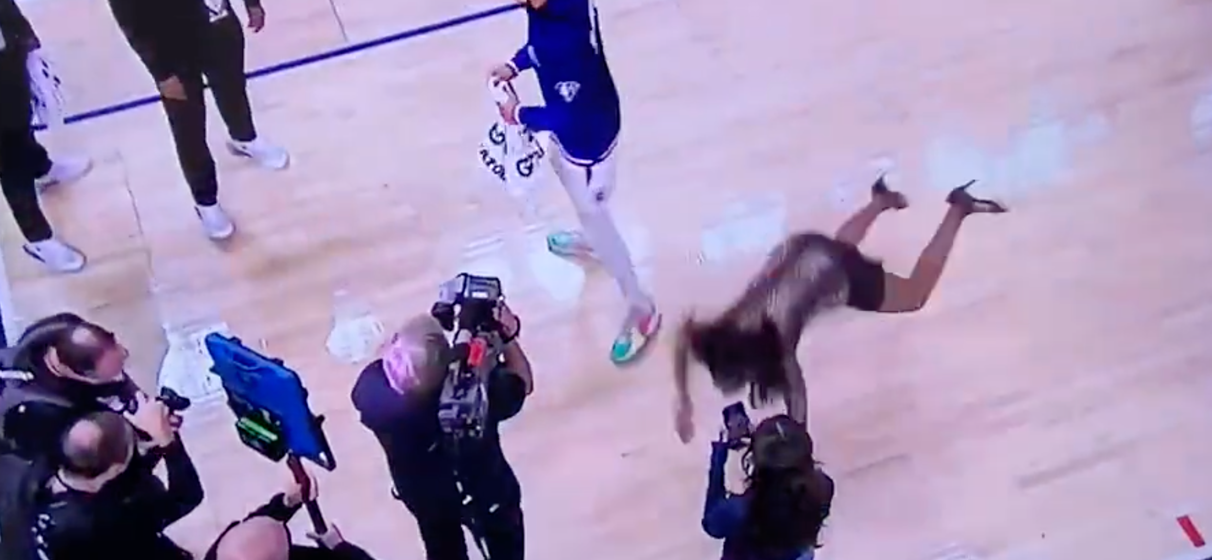 NBA Reporter Face Plants In BRUTAL Fall During Post-Game Interview