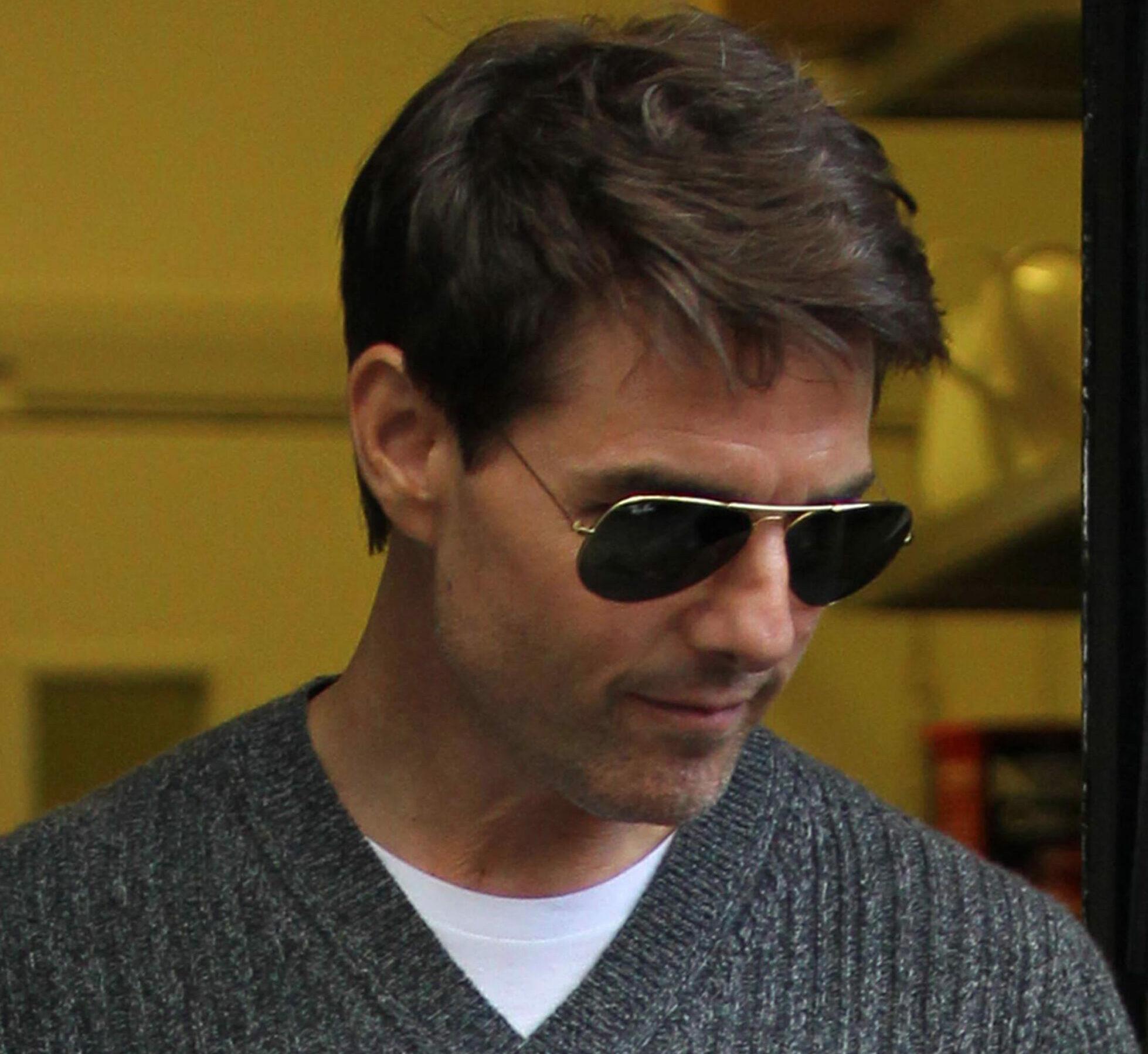 Tom Cruise is seen leaving an office building in Holborn.