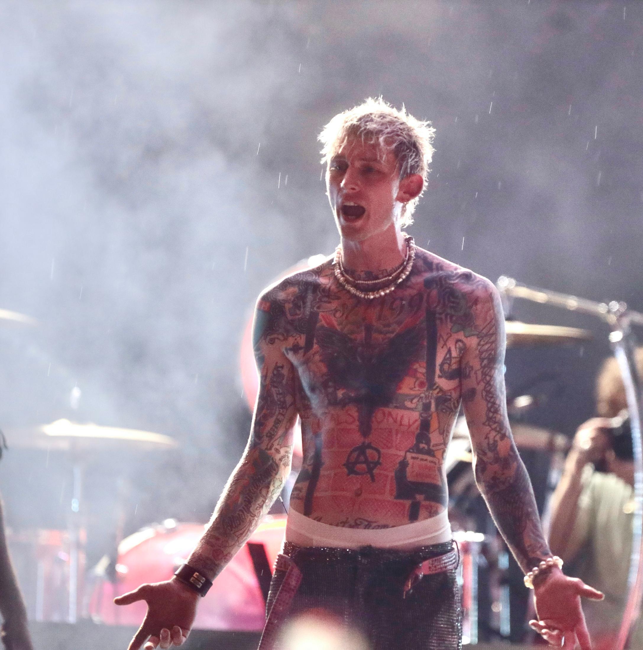Machine Gun Kelly Tries to continue his Summer stage Central Park concert despite the officials turning off the sound system because of an approaching thunderstorm.