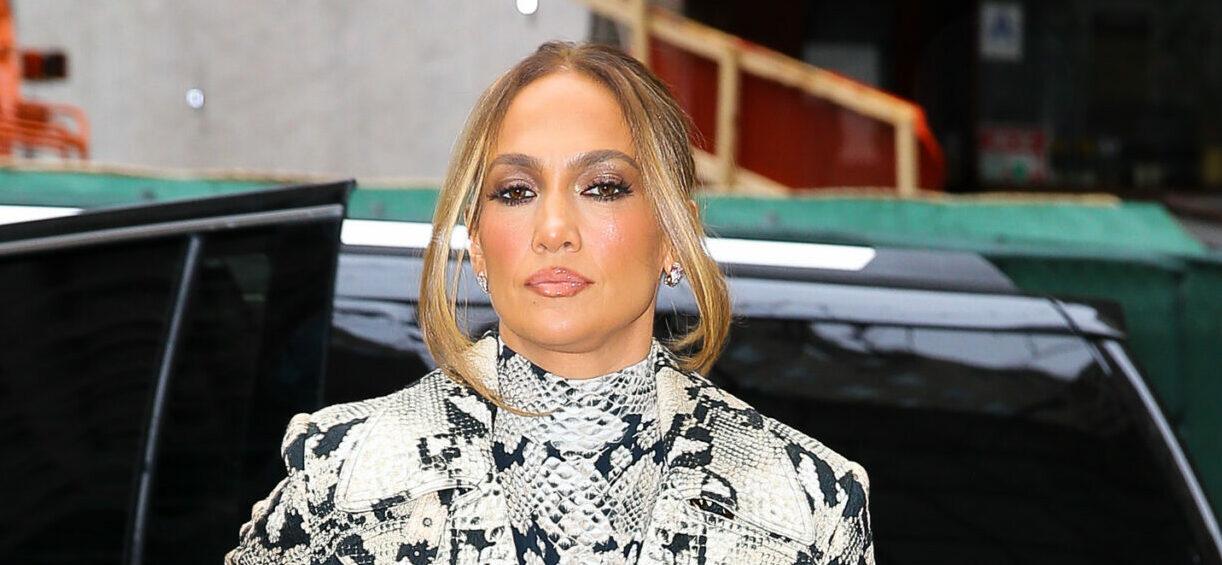Jennifer Lopez wears a snake print ensemble