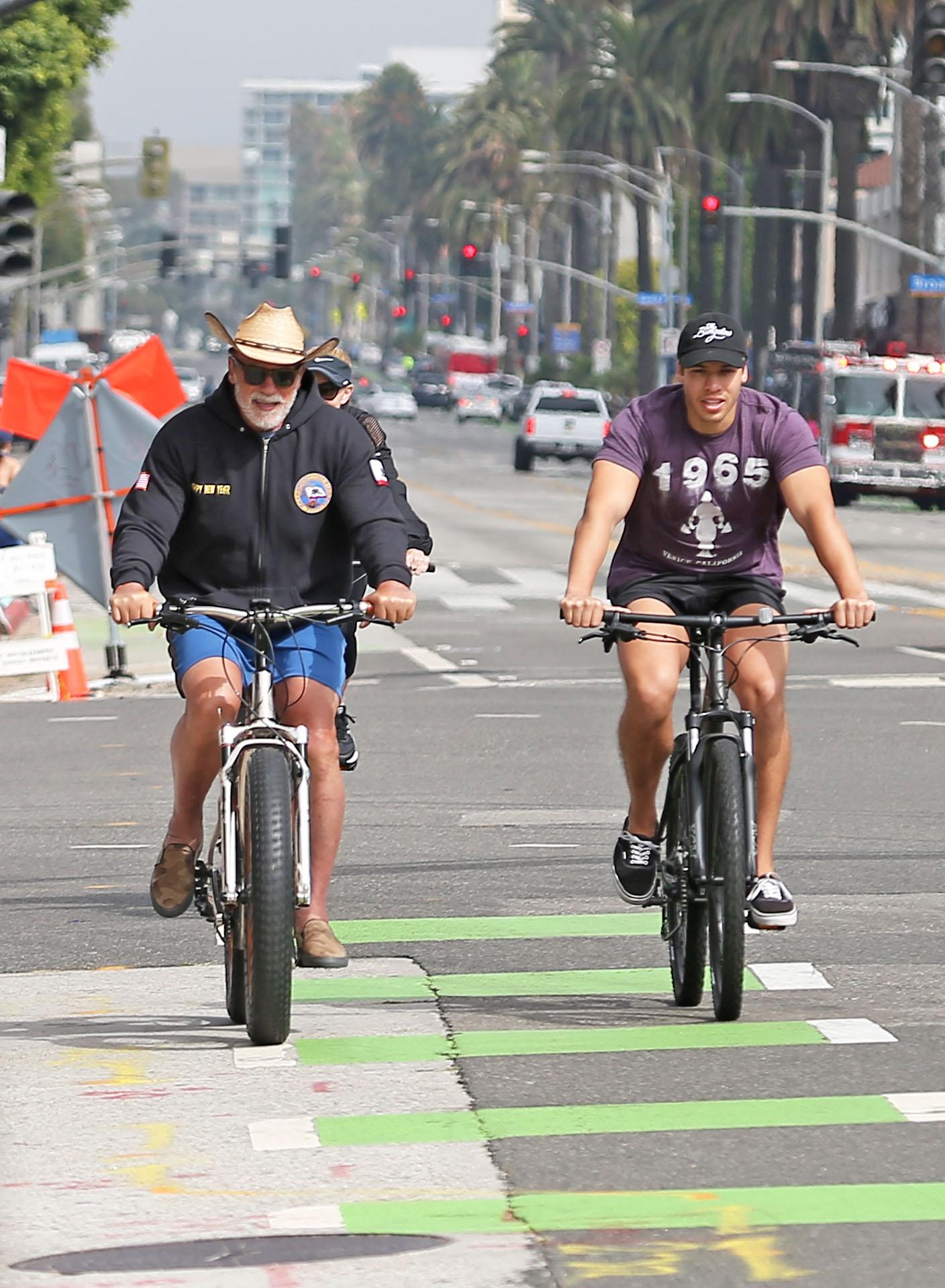 Arnold Schwarzenegger bike riding with son Joseph Baena in Santa Monica