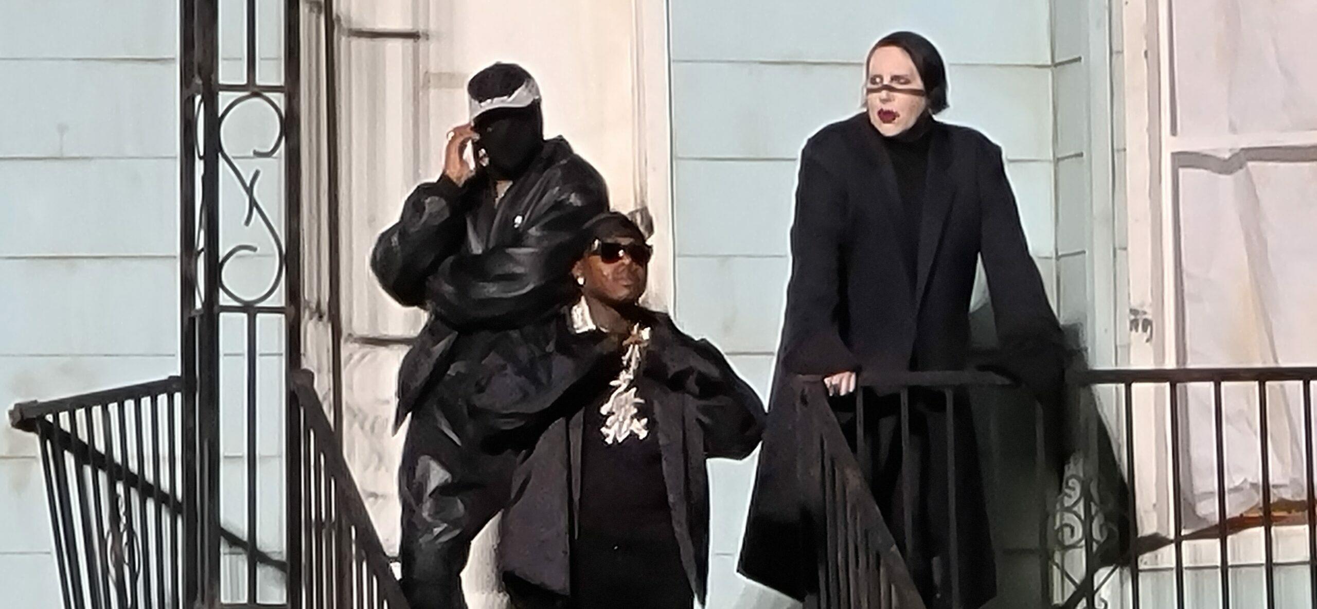 Marilyn Manson and Kanye West hang out on stage of a replica house of Kanyes late mother Donda in Chicago
