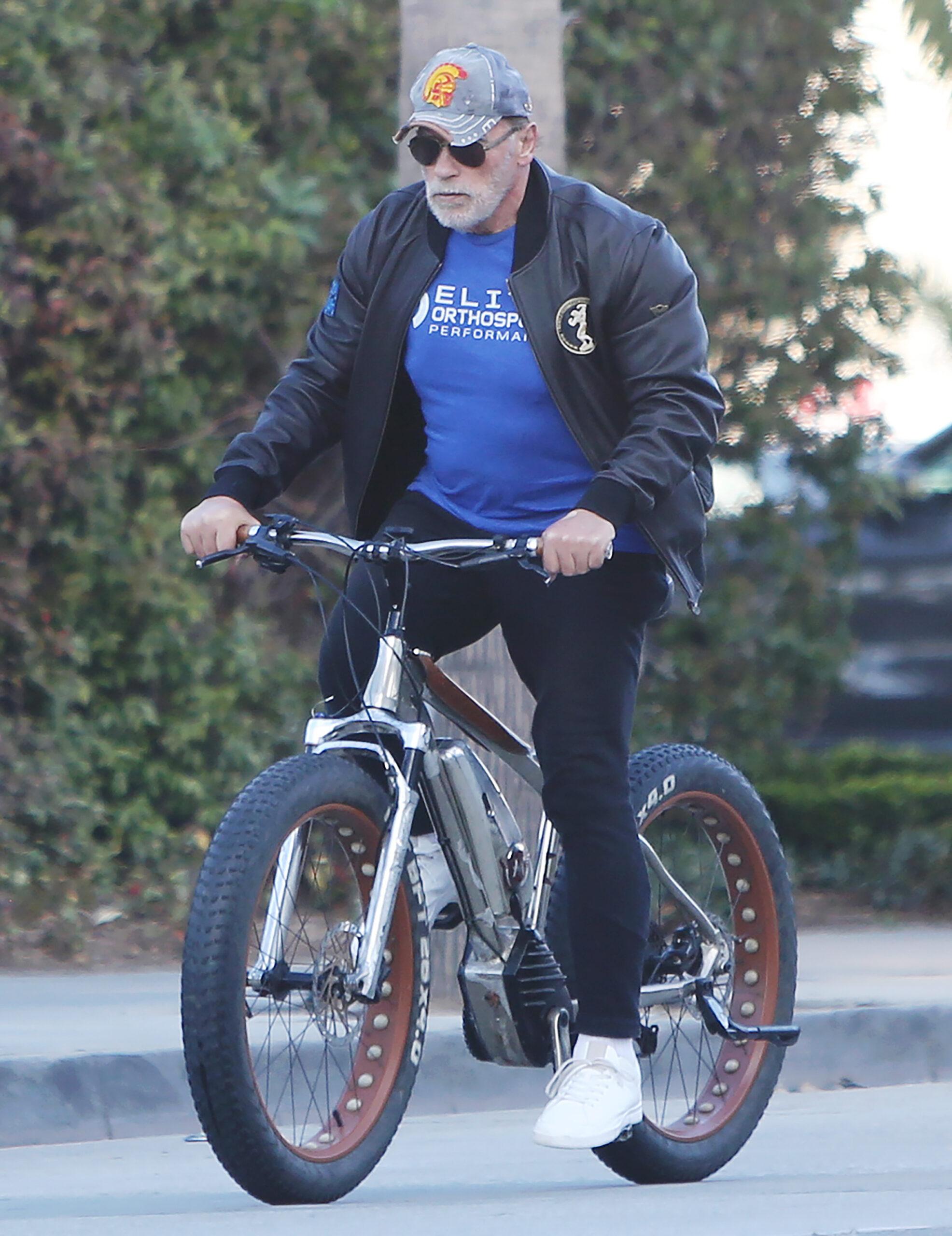 Arnold Schwarzenegger biking with his pals in Santa Monica