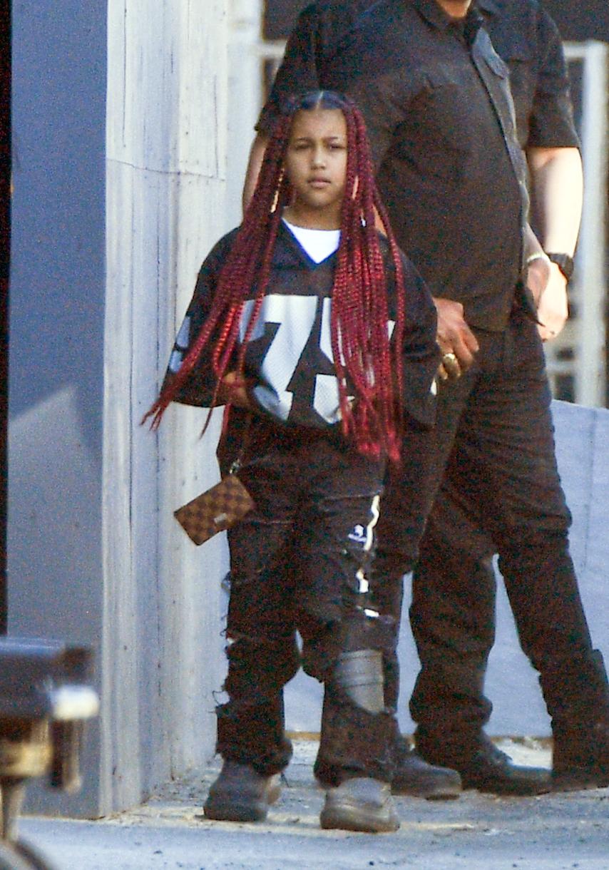 Kanye West North West and Antonio Brown are seen leaving Sunday Services in Downtown Los Angeles