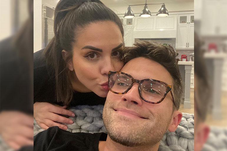 Katie Maloney gives Tom Schwartz a kiss on the cheek