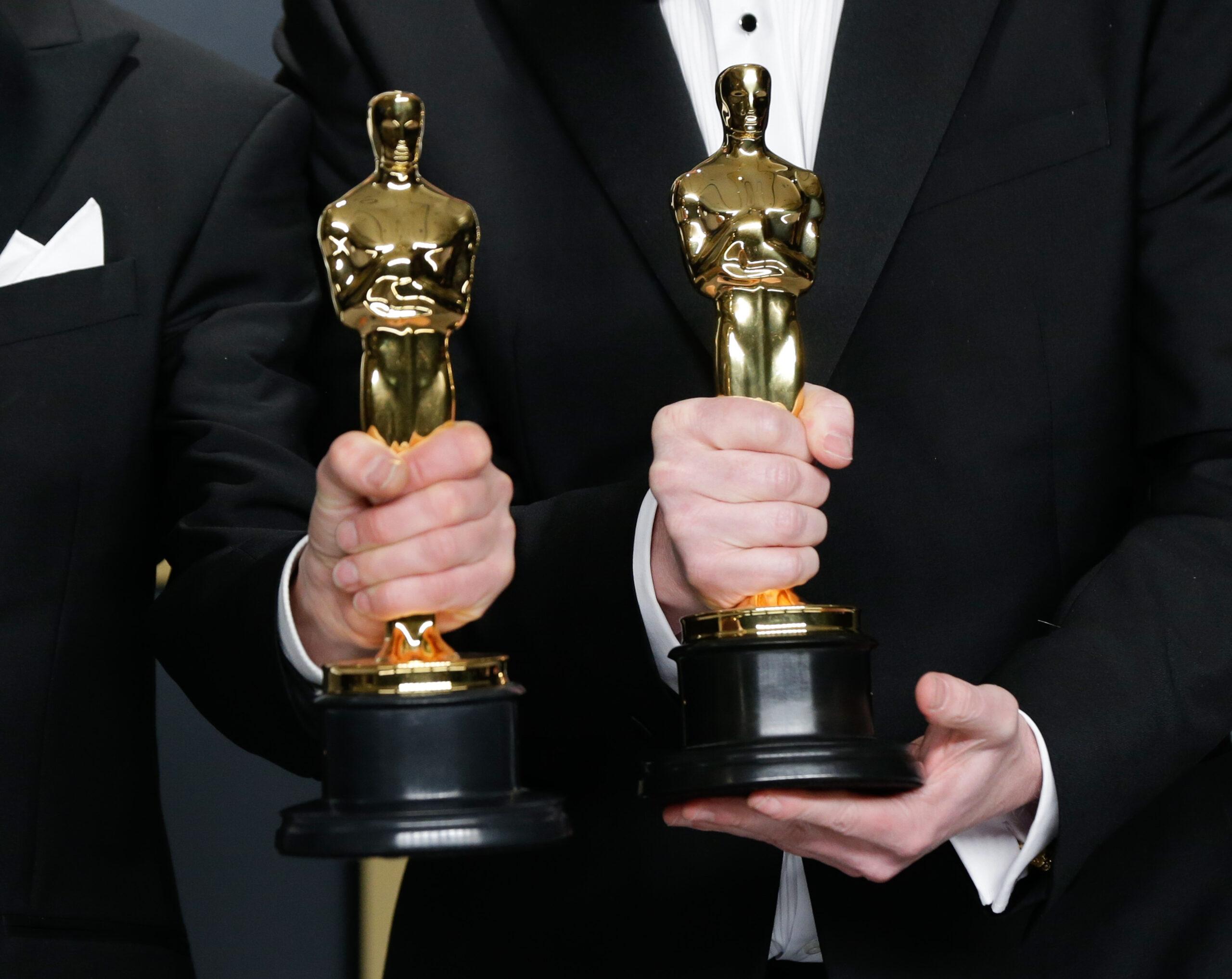 Stuart Wilson (L) and Mark Taylor, winners of Best Sound Mixing for "1917," appear backstage with their Oscar during the 92nd annual Academy Awards