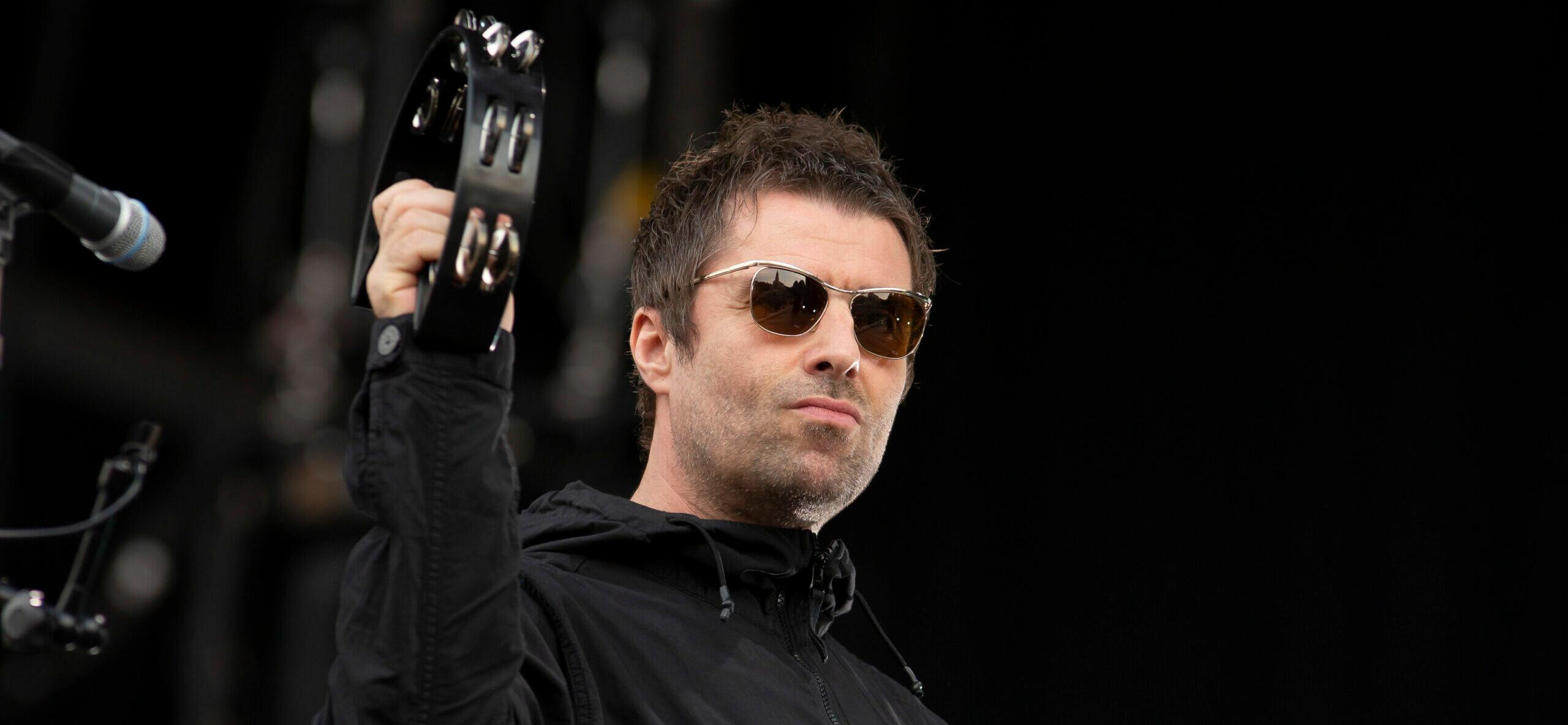 Liam Gallagher sing and plays during the Main square music festival