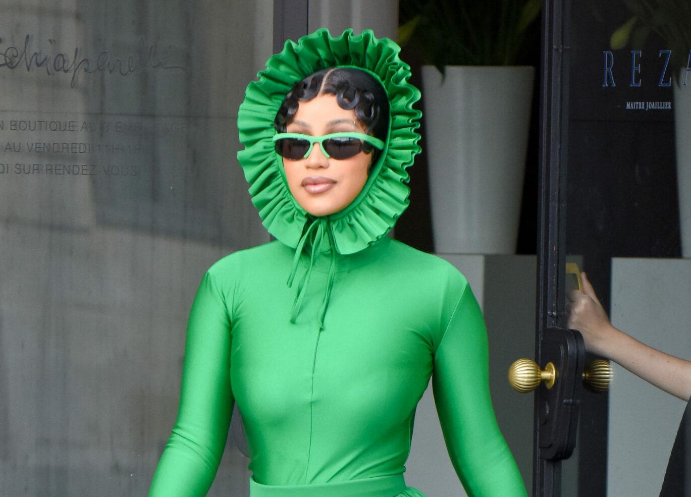 Cardi B is seen dressed as a green flower in Paris as she visits Schaperrili.