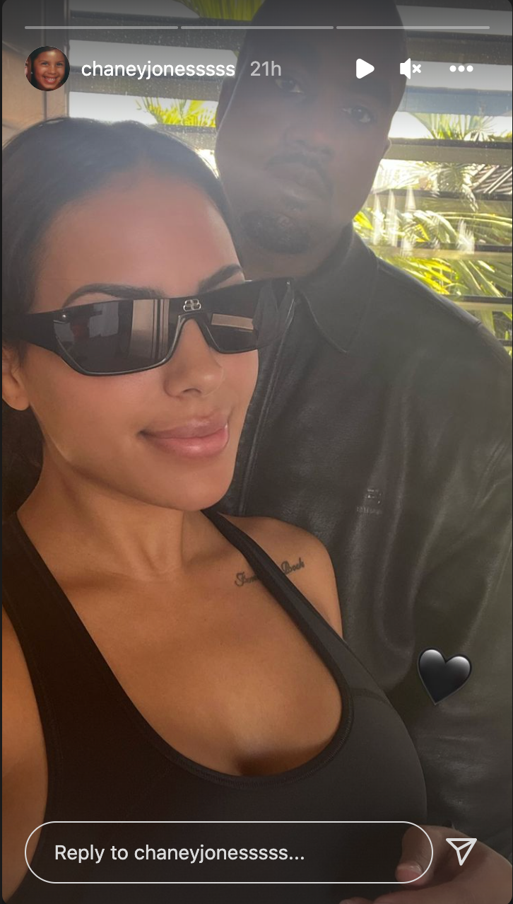 Kanye West smiling with Chaney Jones