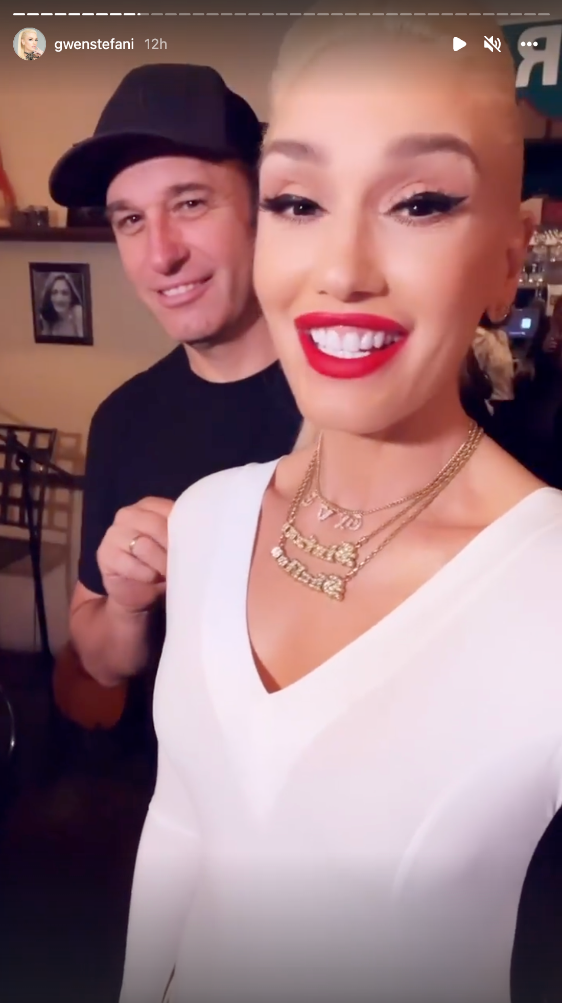 Gwen Stefani talking to the camera with her brother Todd.