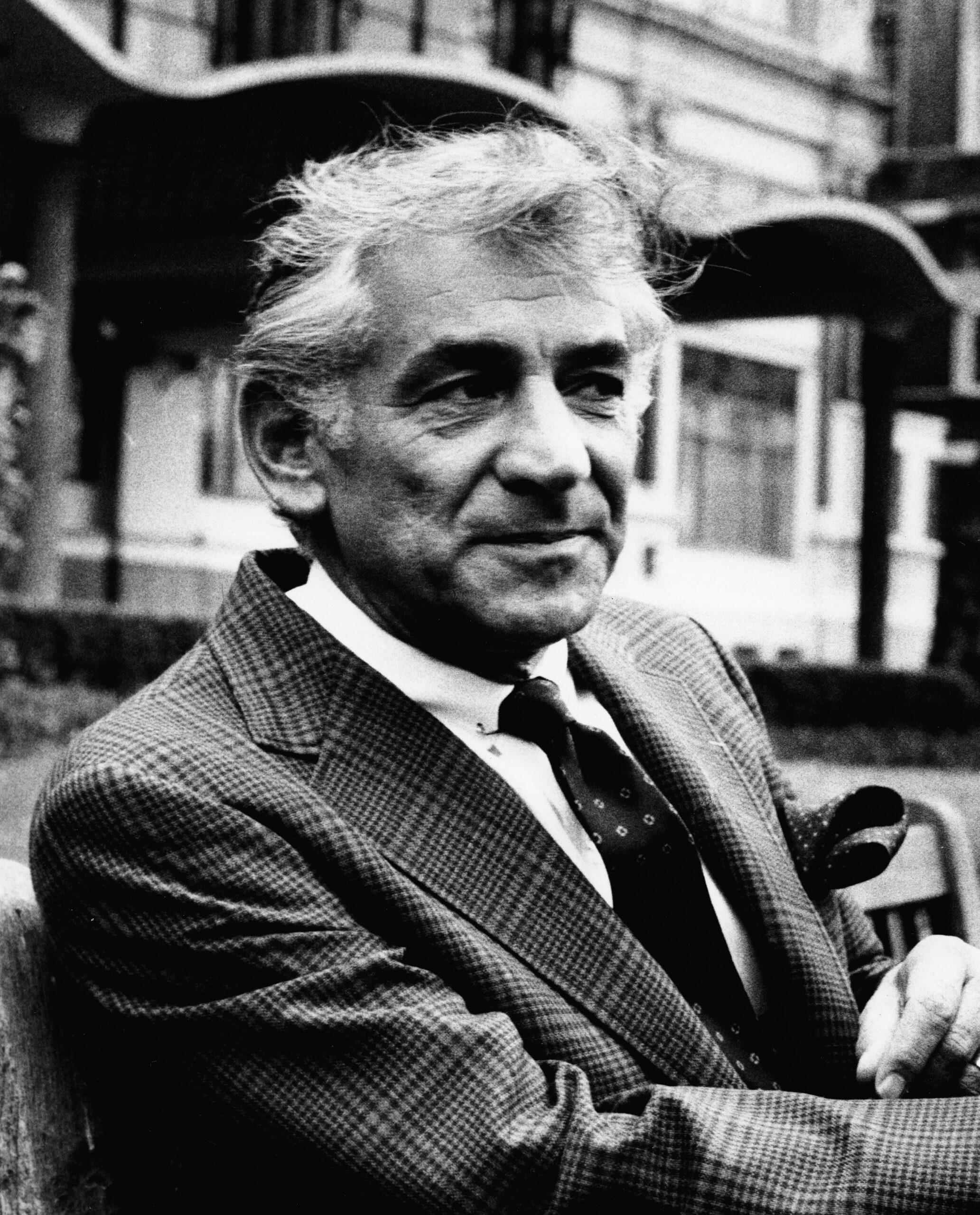 Leonard Bernstein (1918-1990), American composer, outside the Savoy Hotel, London. 