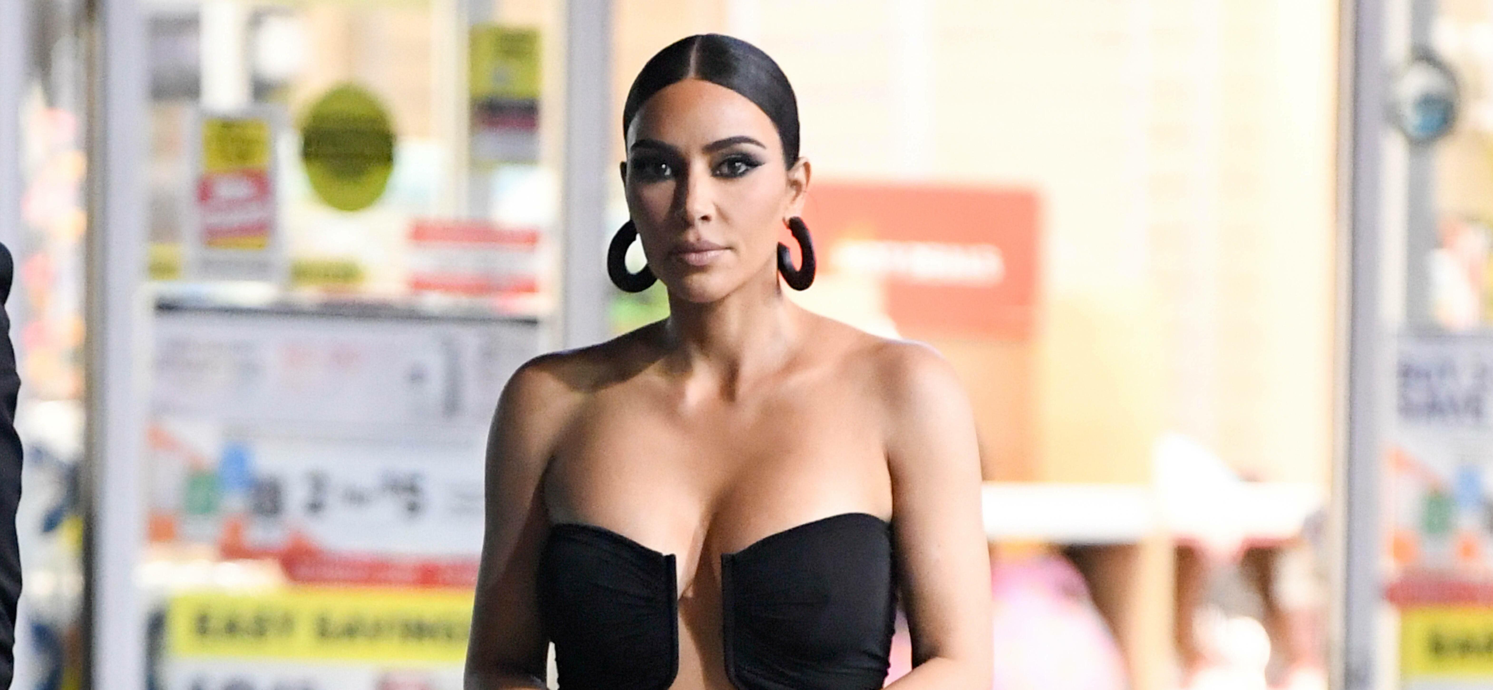 Kim Kardashian is seen at a convenience store after coming from Paris Hiltons wedding looking stunning in a Rick Owens dress with Balenciaga accessories