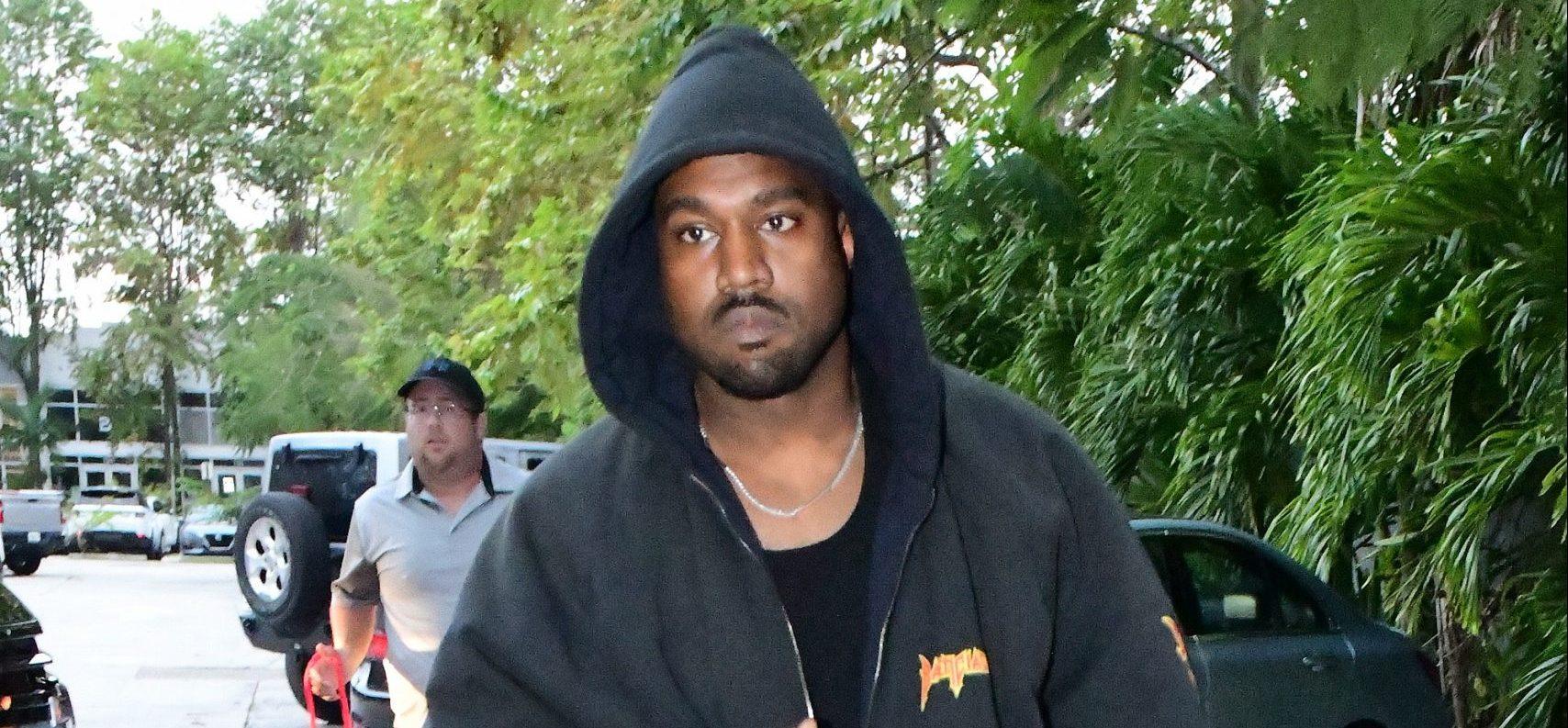 Kanye West is seen for the first time since becoming legally single as he hits up a tattoo shop in Miami