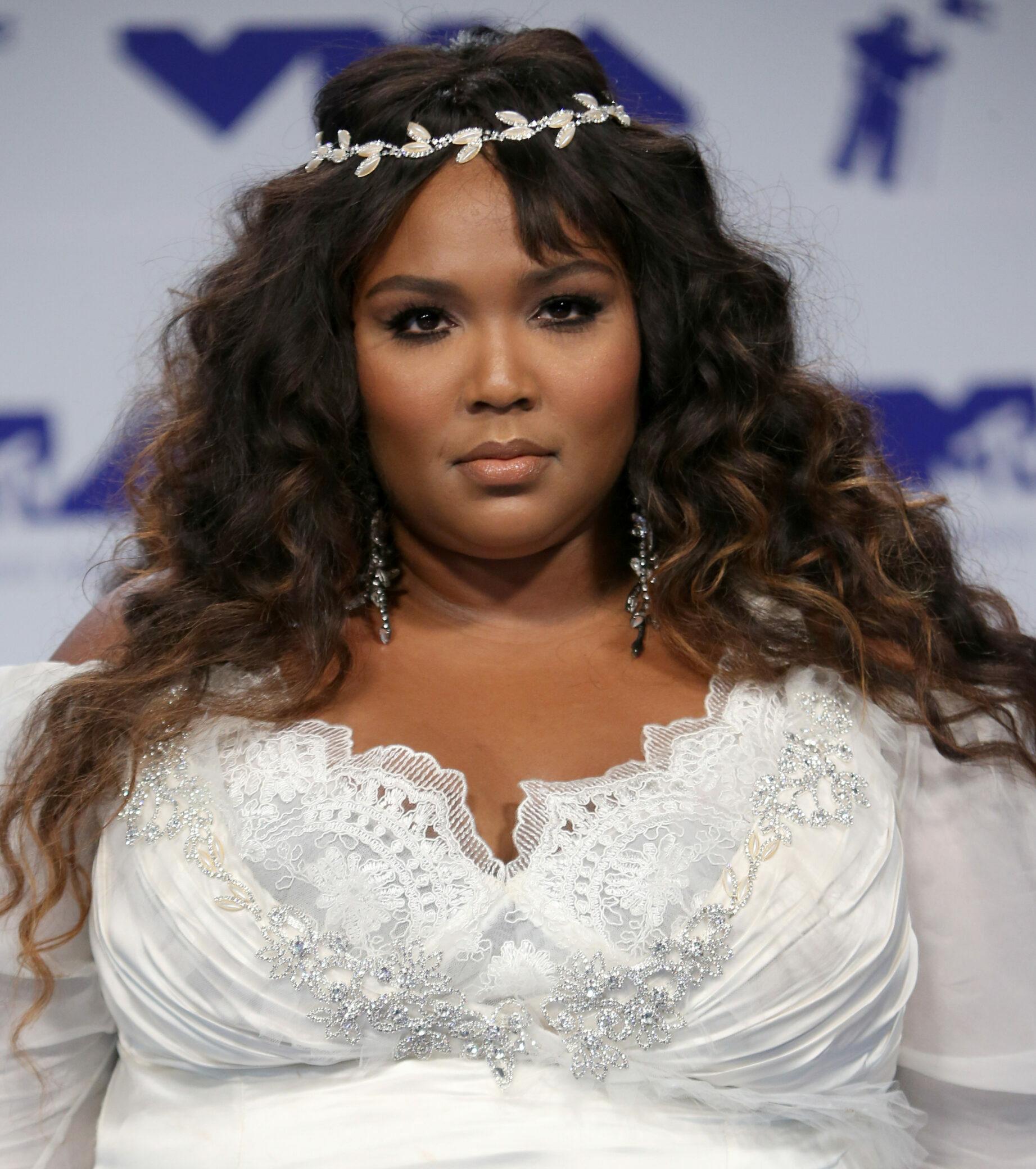 Lizzo Launches 'Radically Different' Shapewear With Bold Tattoo On Booty