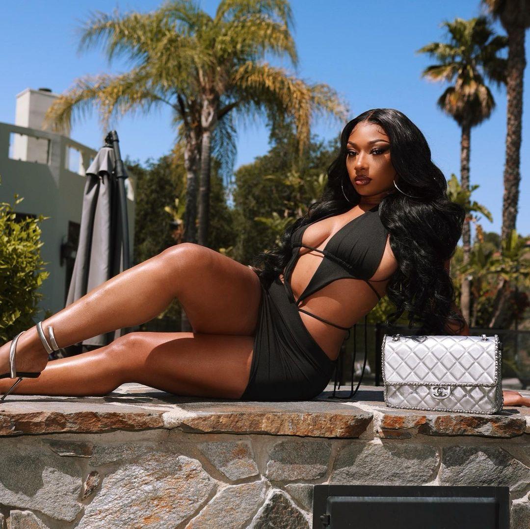 Megan Thee Stallion puts on a busty display in black bra and sheer top