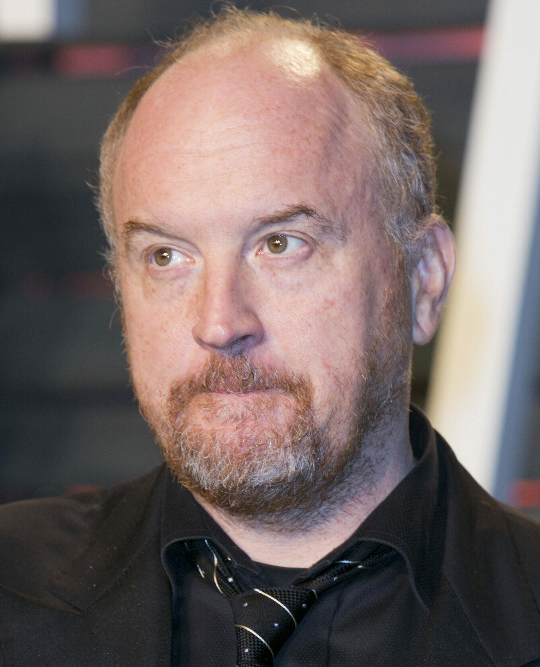 Louis C.K. on the red carpet at the 2016 Vanity Fair Oscar Party
