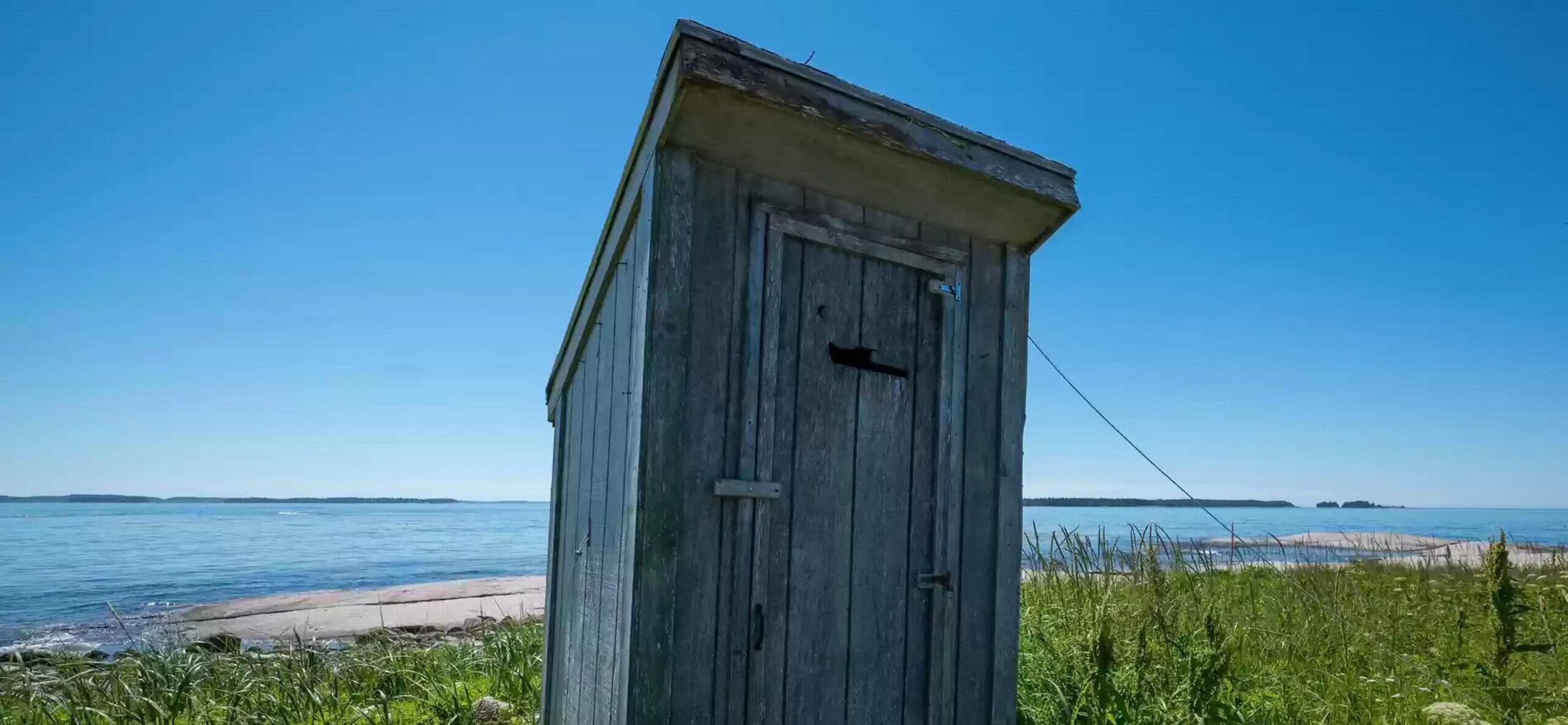 Remote private island with tiny cottage, outdoor toilet and no shower in chilly Maine on the market for $339,000