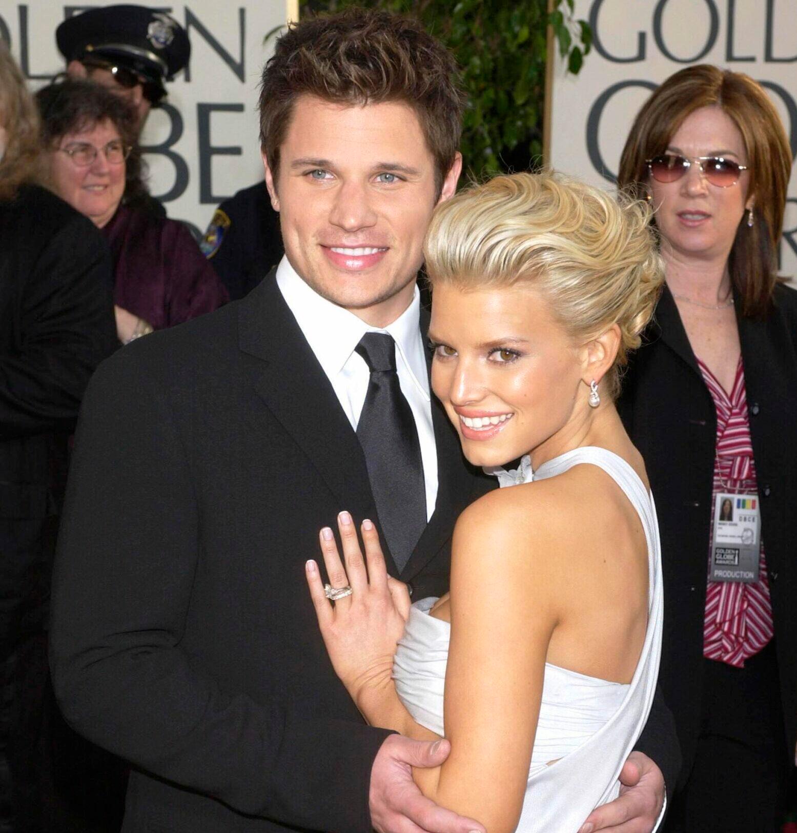 Nick Lachey and Jessica Simpson at the 61ST ANNUAL GOLDEN GLOBE AWARDS.