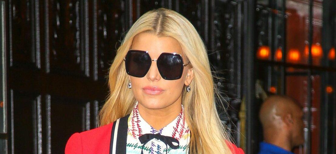 Jessica Simpson seen wearing a red blazer as leaving her hotel in NYC on Feb 06 2020