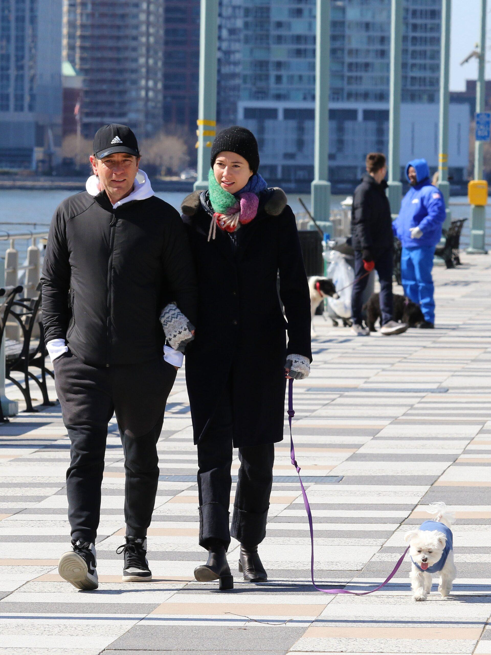 Ewan McGregor and girlfriend Mary Elizabeth Winstead share a passionate kiss while walking their dog in NYC