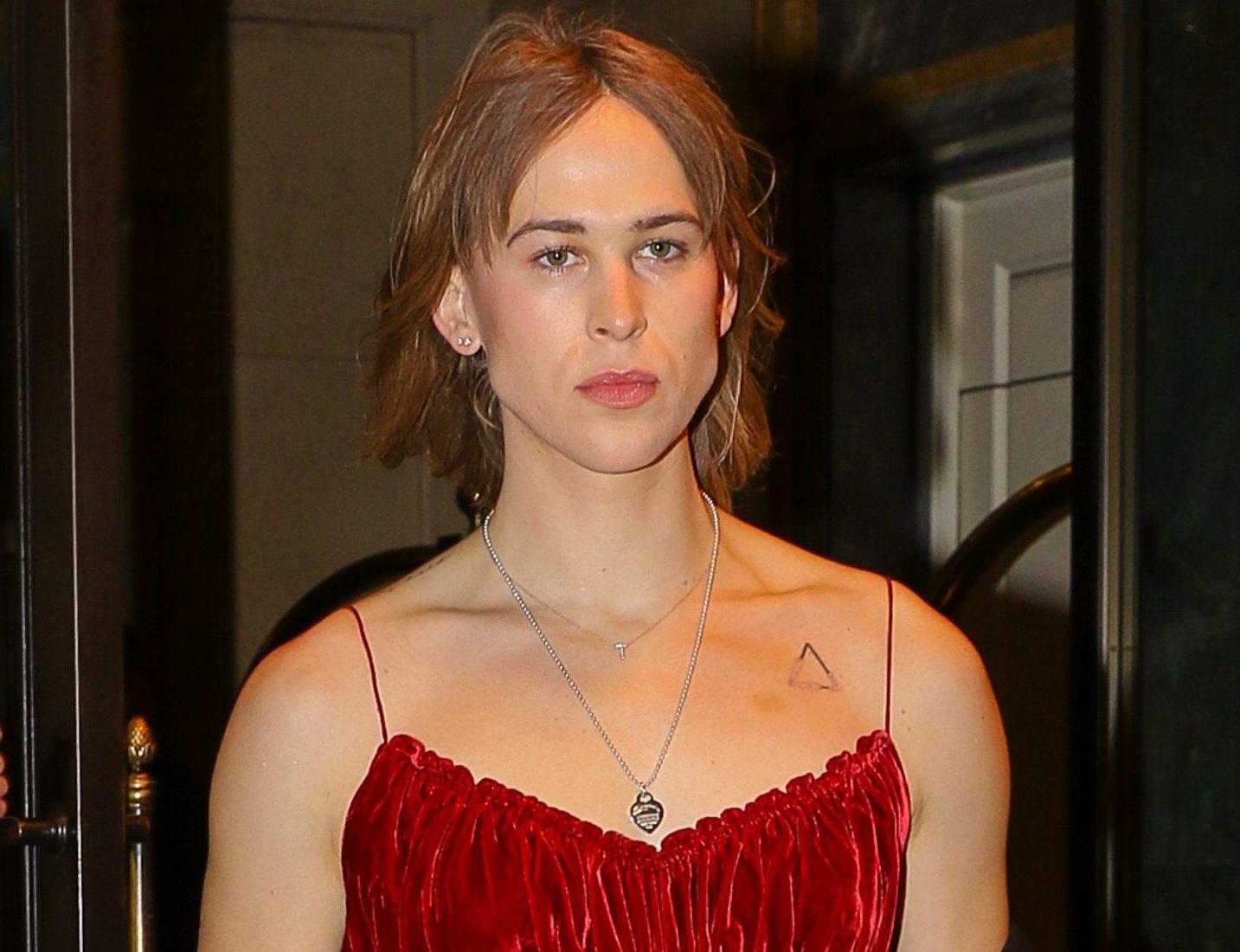 Tommy Dorfman looks radiant in a red velvet dress as leaving The Ritz-Carlton Hotel in NYC