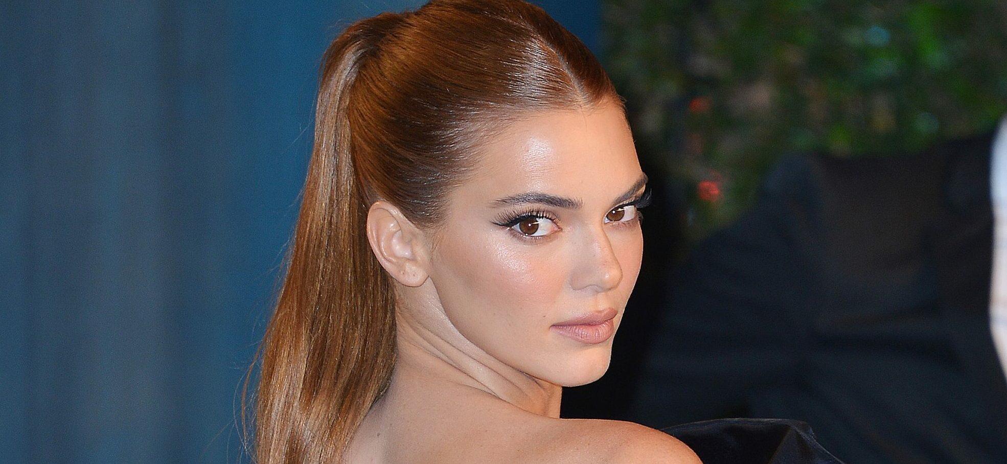 Kendall Jenner goes topless with tequila