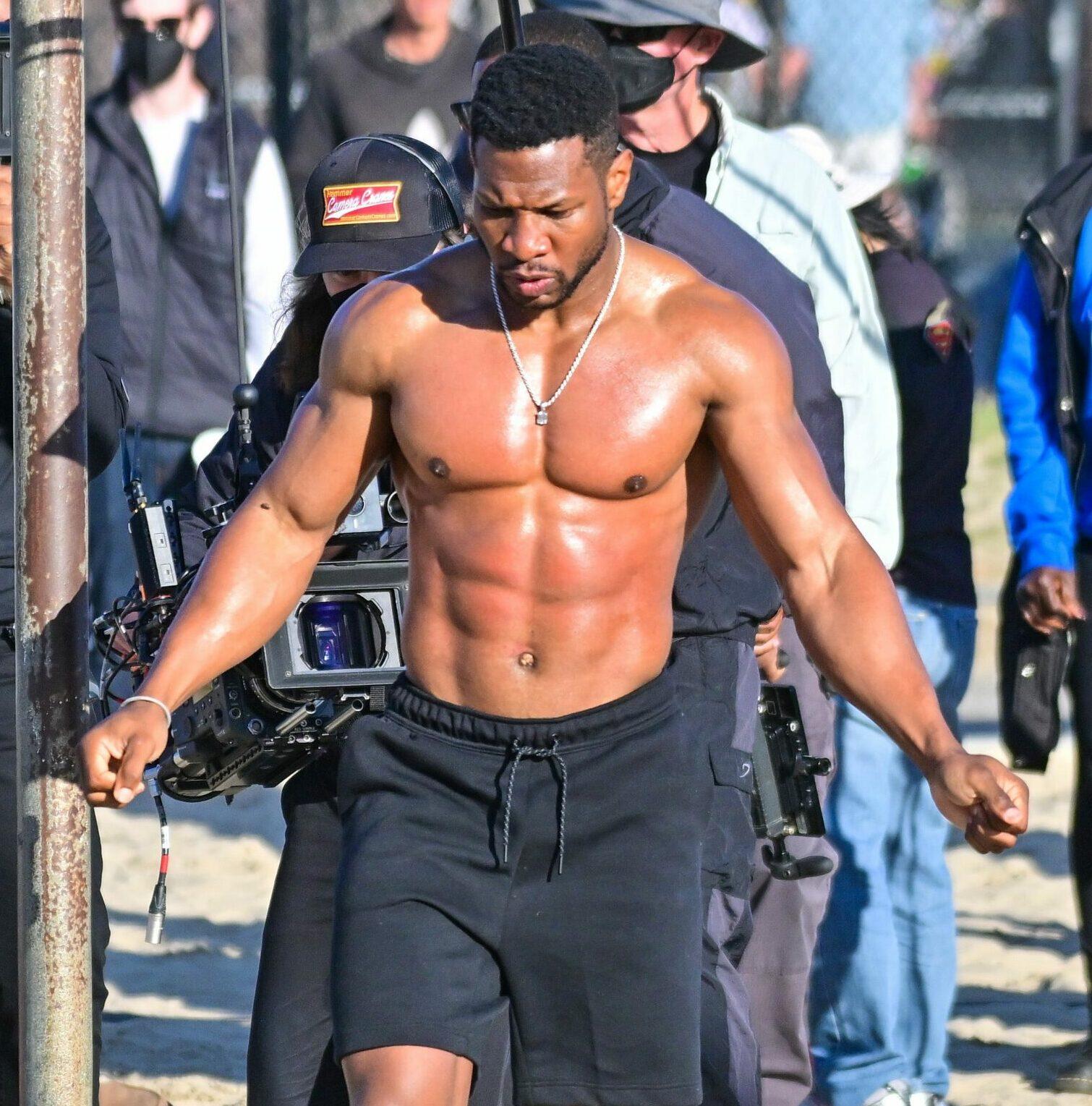 Michael B Jordan is all smiles as he directs "Creed III" directing a shirtless Jonathan Majors