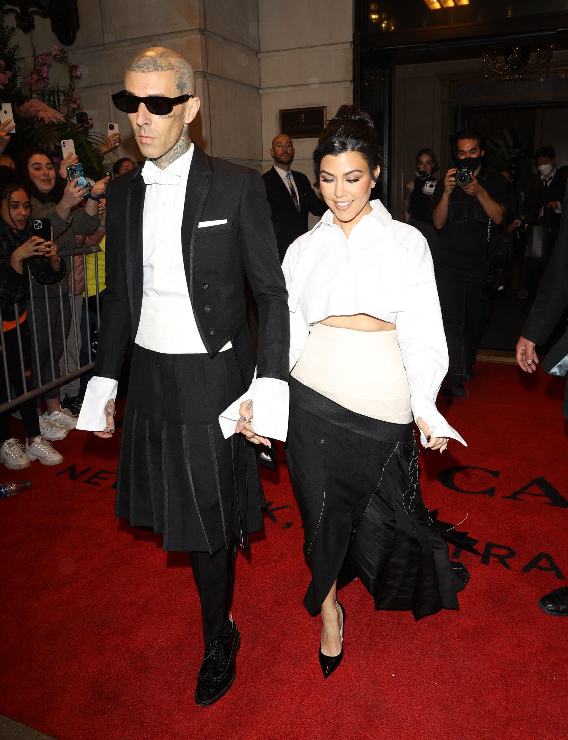 Kourtney Kardashian and Travis Barker leave the Ritz Carlton Hotel on their way to the Met Gala