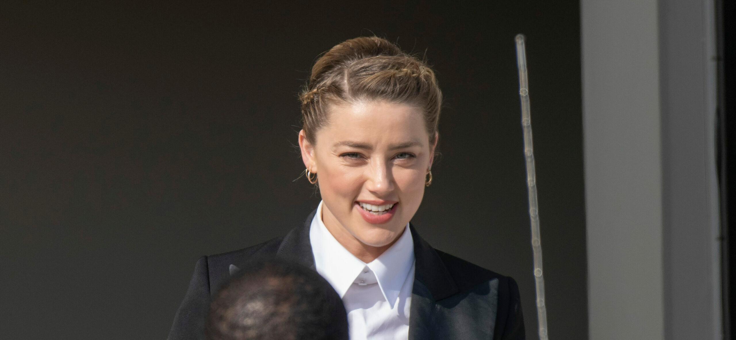 Amber Heard spotted bargain shopping, could be "broke"